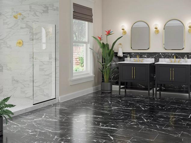 White bathroom with black marble tile flooring. 