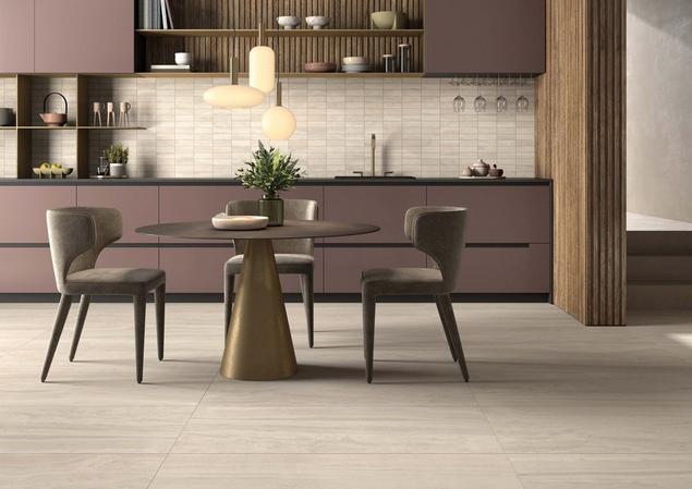 Kitchen with Napoli Sand Porcelain Tile flooring and plum color cabinets.