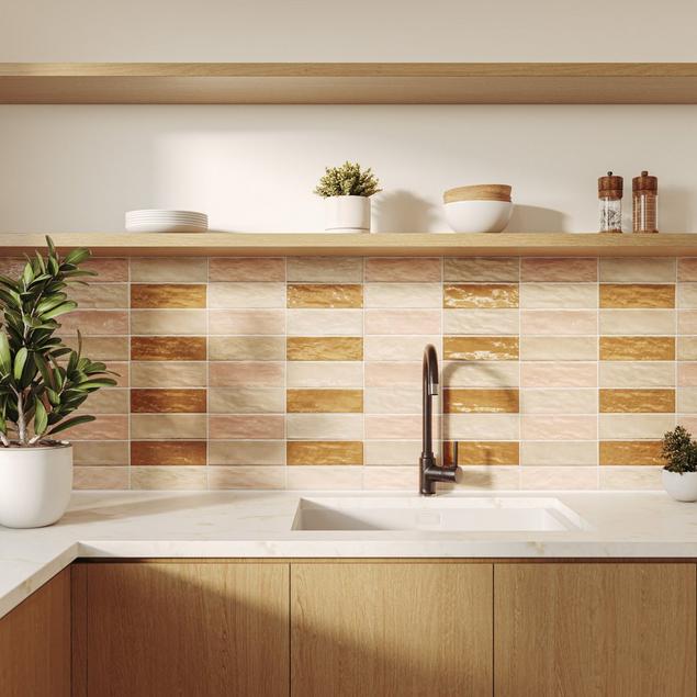 Kitchen with cream, light pink, and beige zellige tile backsplash.