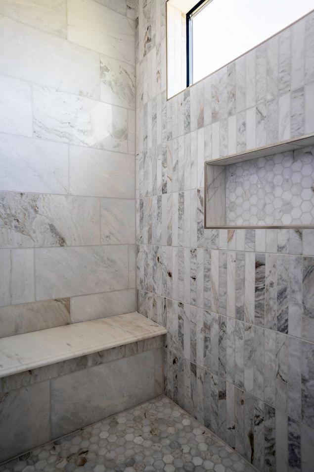 Marble shower with marble mosaic