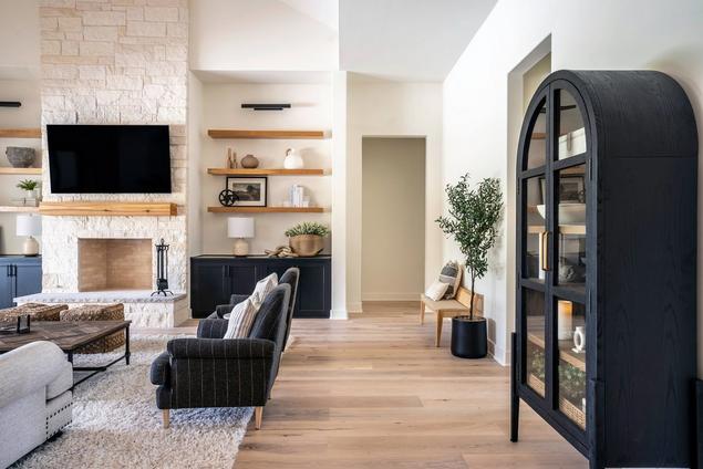 Living area with engineered hardwood floors.