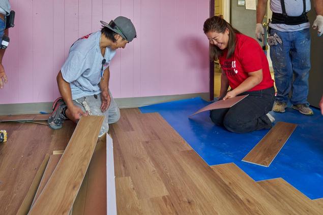 Team Reviewing & Assembling flooring