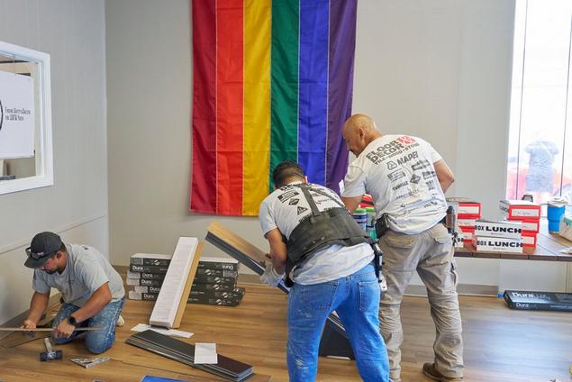 Team assembling flooring