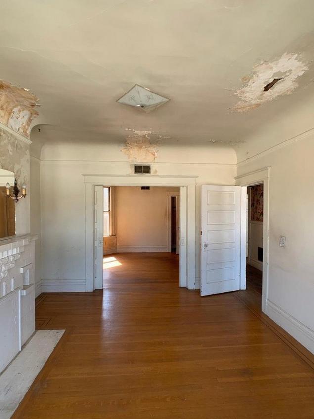 Living room for one of the units before the renovation.