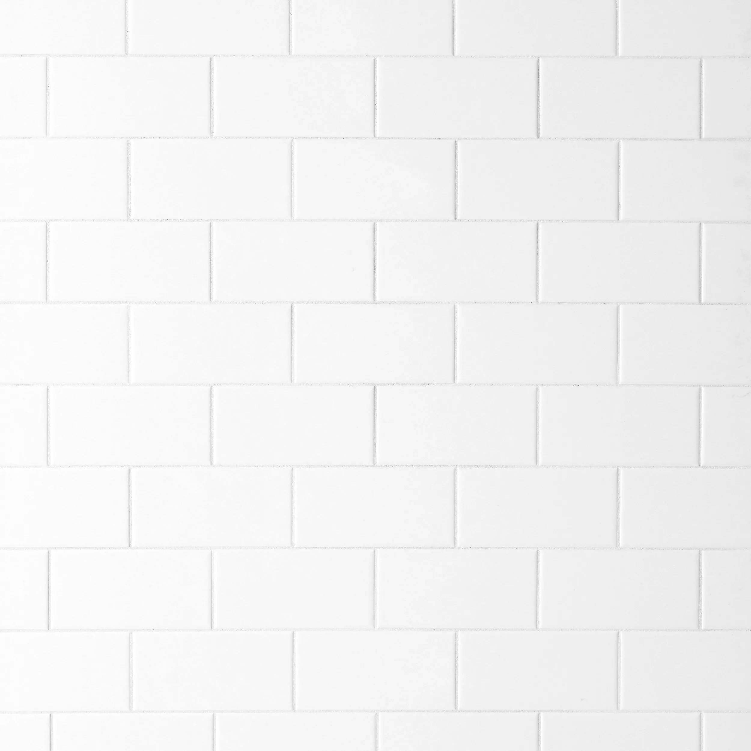 https://i8.amplience.net/i/flooranddecor/914100887_bright-white-ice-subway-ceramic-wall-tile_display?&fmt=webp&qlt=85