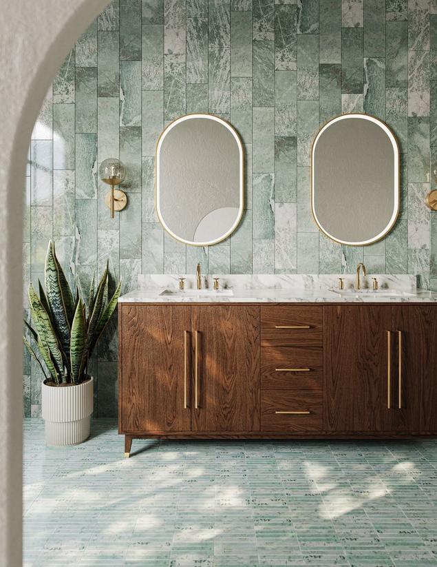 Bathroom with green Emerald Shores Marble floors and walls. 