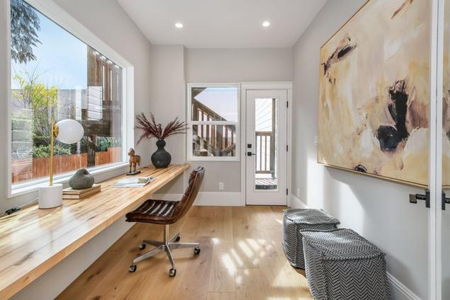 Office for one of the units with engineered white oak hardwood flooring.