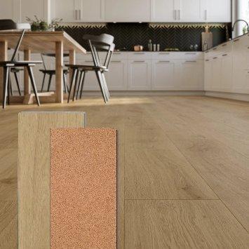 A vinyl plank showing cork attached pad backing over a kitchen room scene