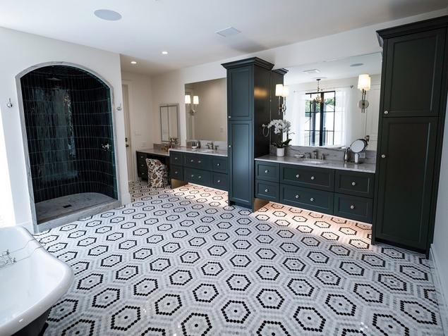 Corner room view of Chloe's black and white marble mosaic flooring.