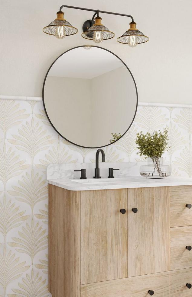 Bathroom with white and beige backsplash tile and matte black and brushed bonze vanity lighting.