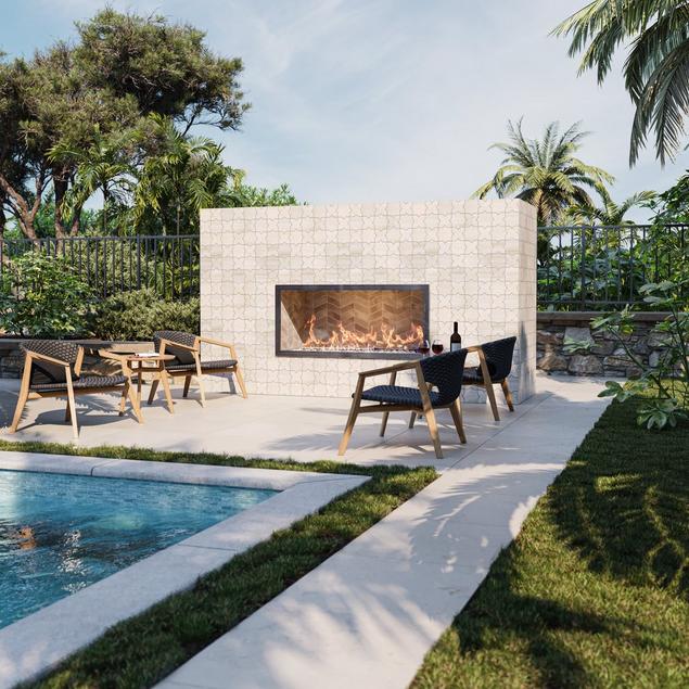 Outdoor seating area and pool deck with beige porcelain pavers. 