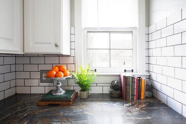 Kitchen with white subway tile