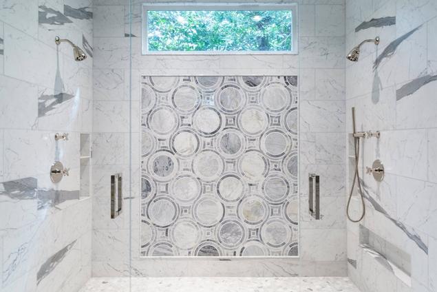 Marble bathroom shower with window