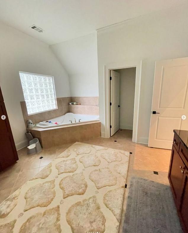 A second view of the primary bathroom with the garden tub before it was remodeled.