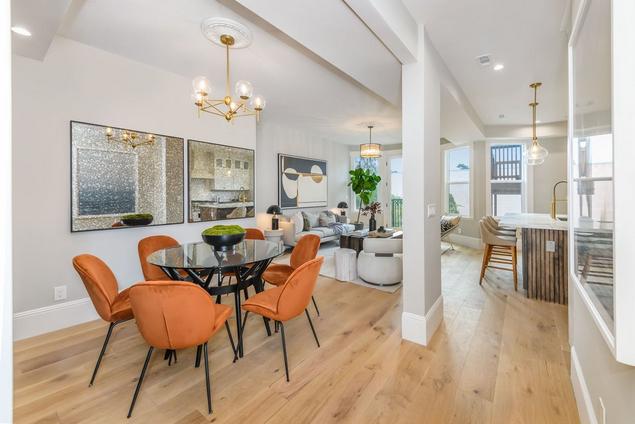 Dining area for one of the units with engineered white oak hardwood flooring. 