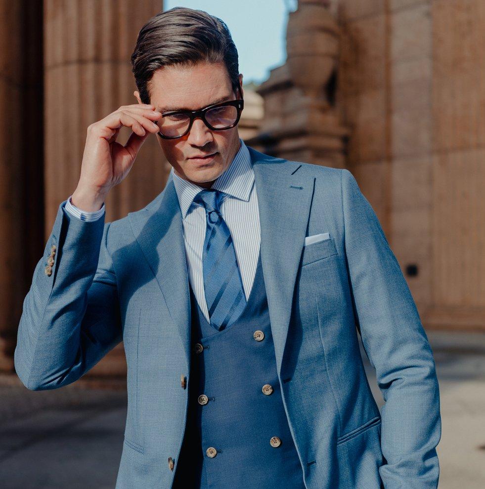 man wearing a blue indochino suit