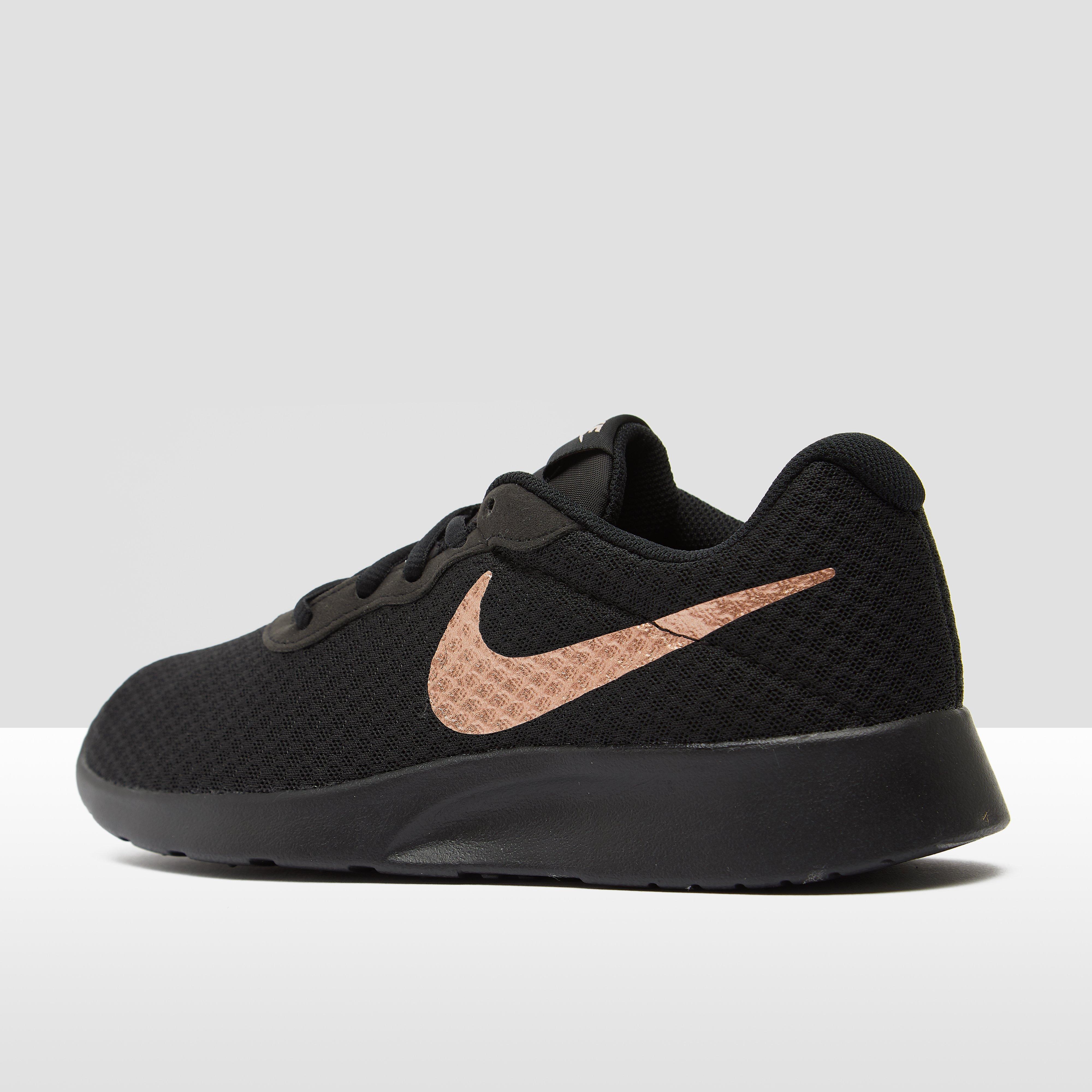 Nike sneakers dames goud online