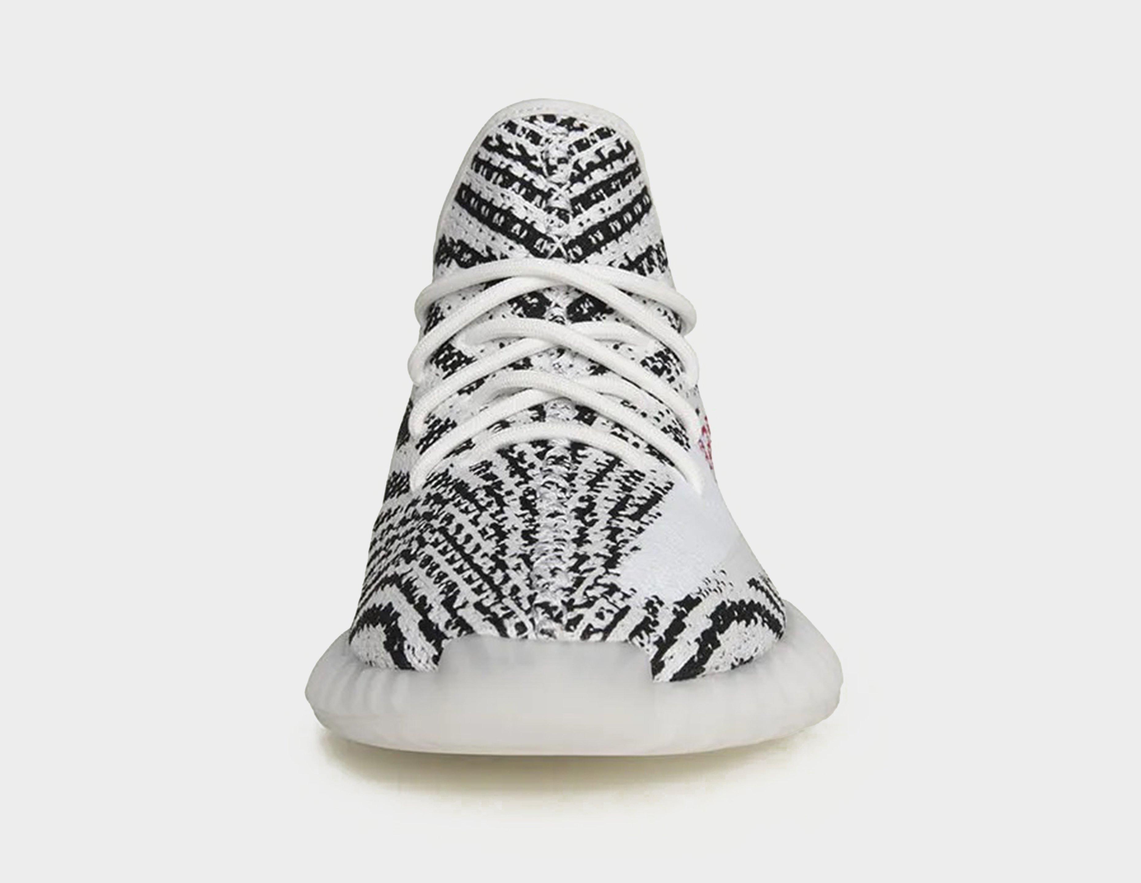 Black and white yeezys 350 best sale