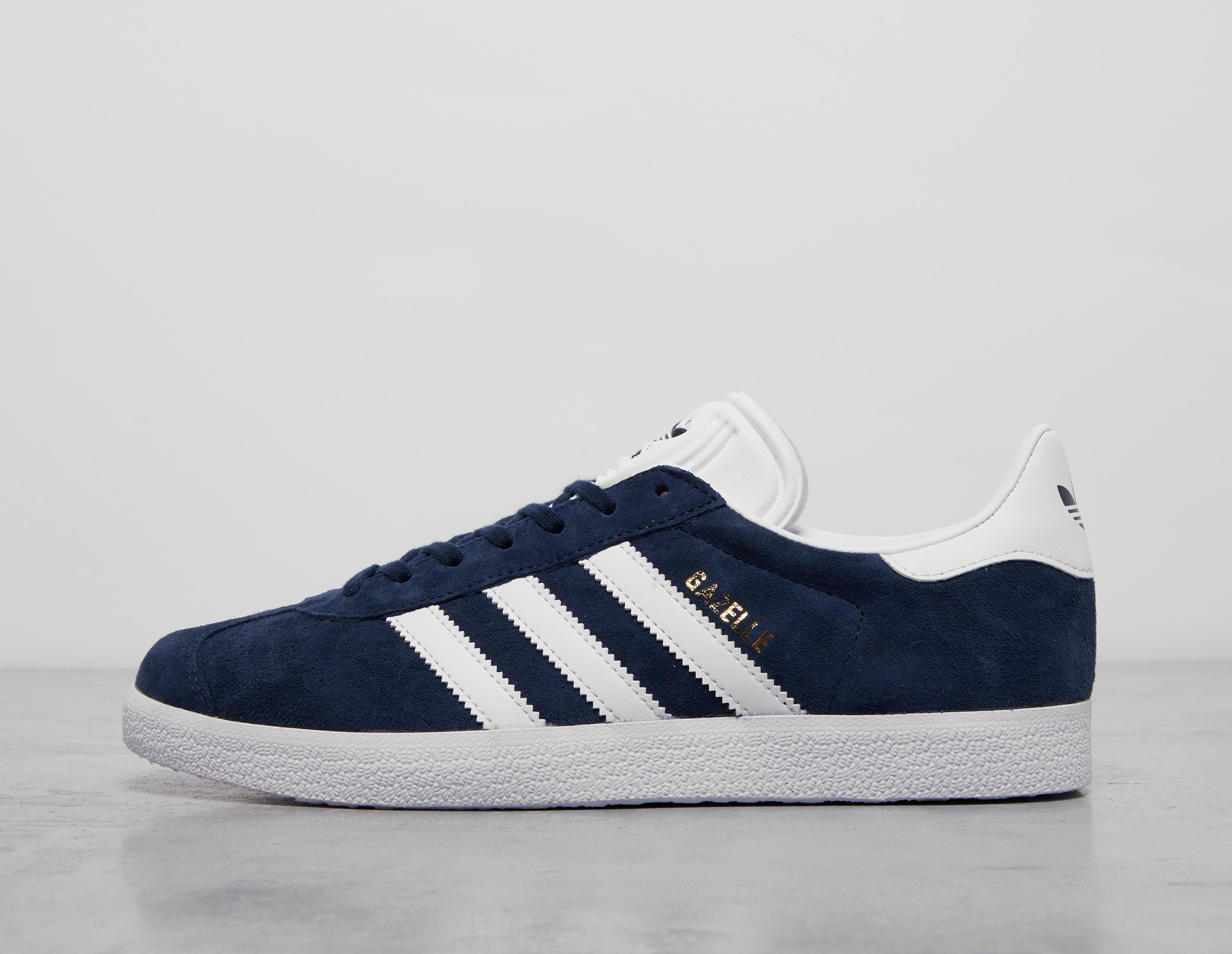 Navy and store white gazelles