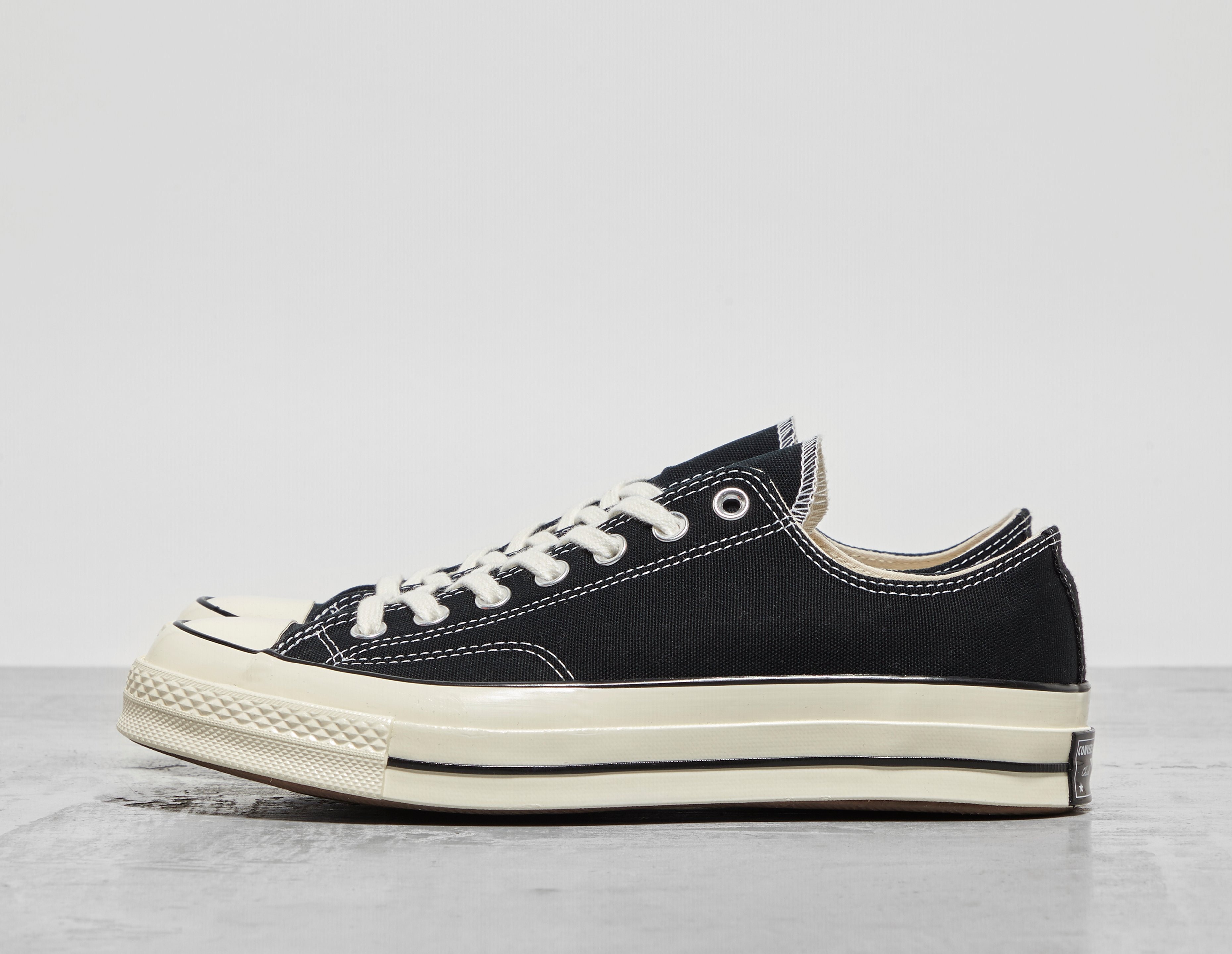 Black and white chucks low tops hotsell