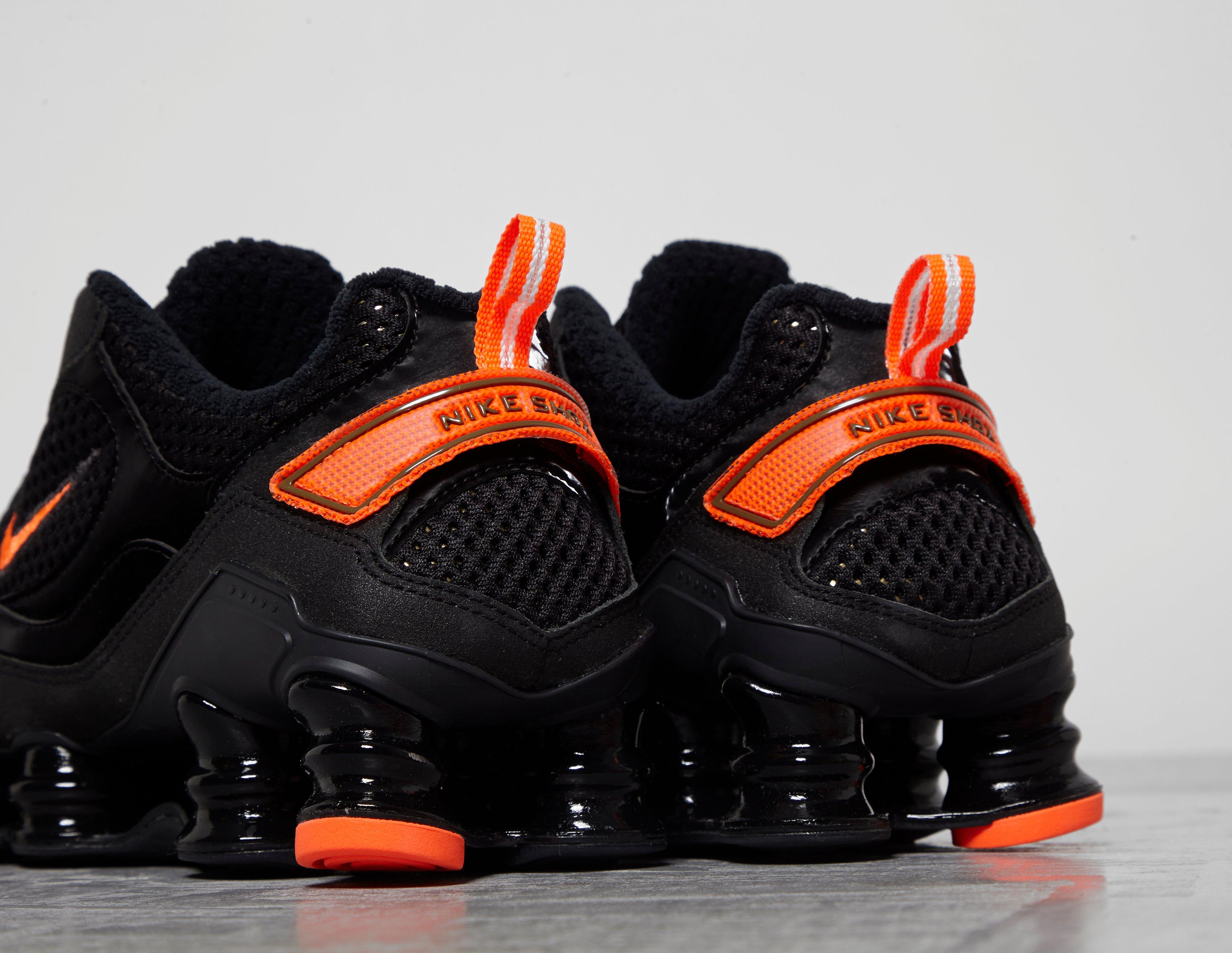 mens orange nike shox