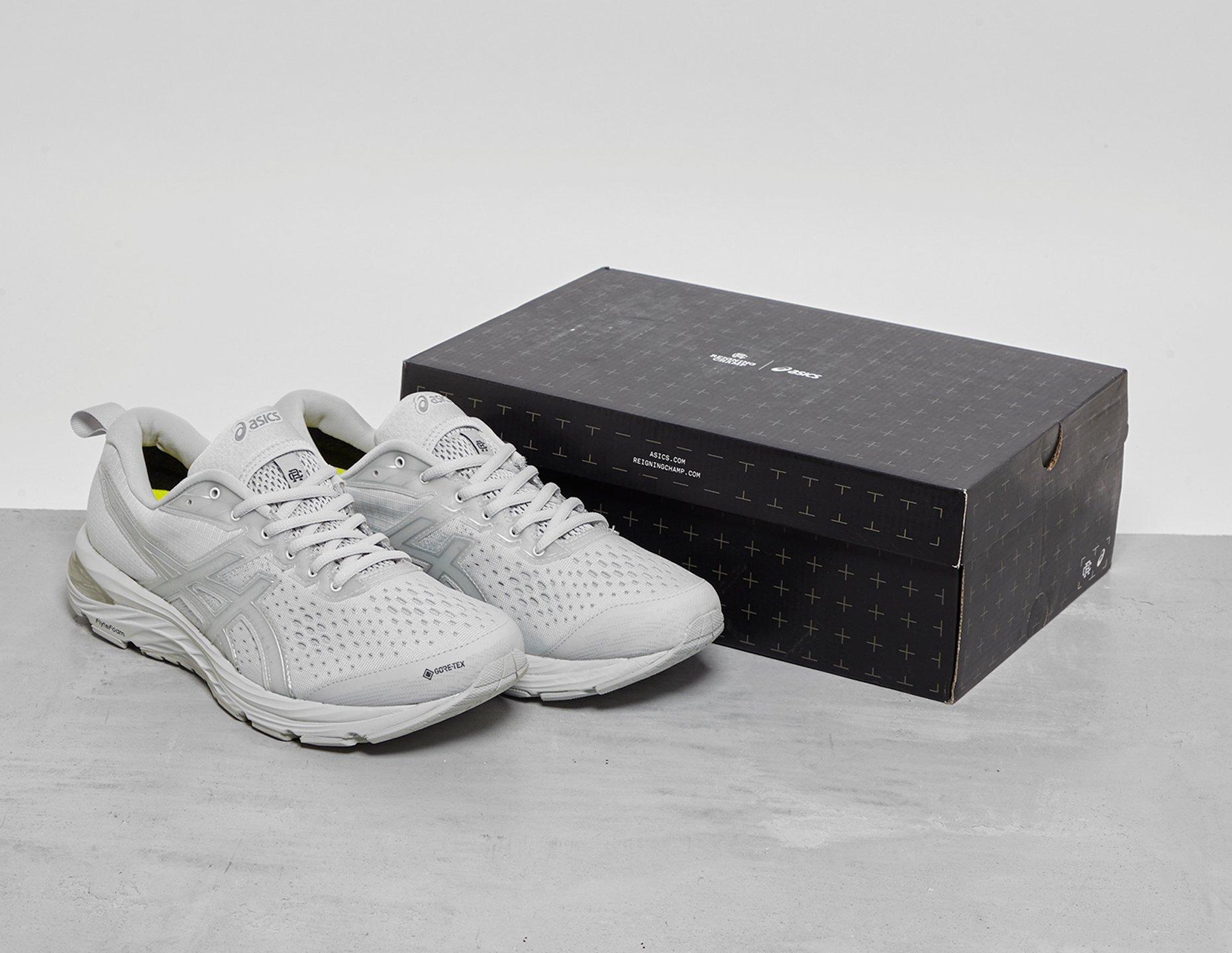 asics reigning champ grey