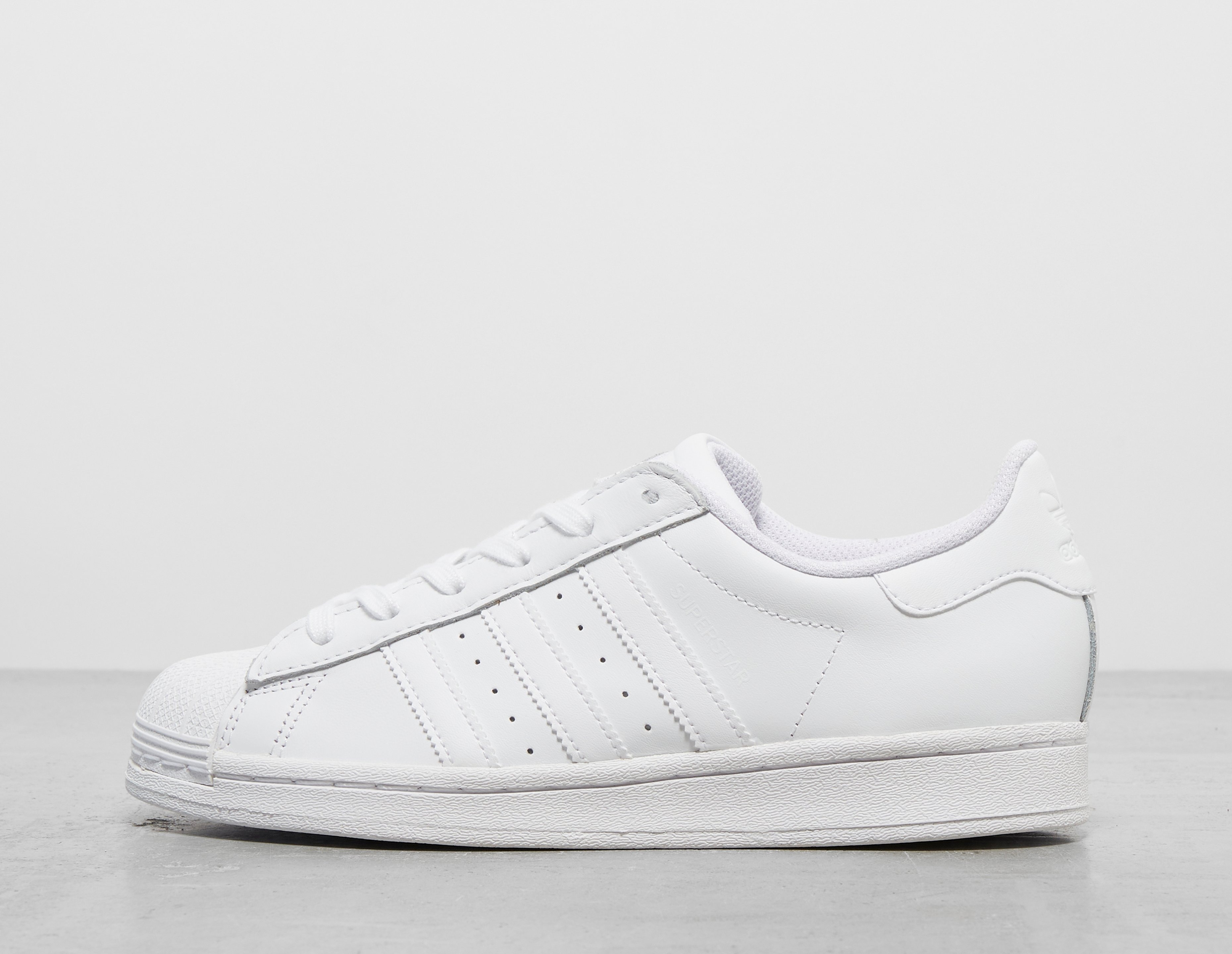 Womens white adidas superstars sales
