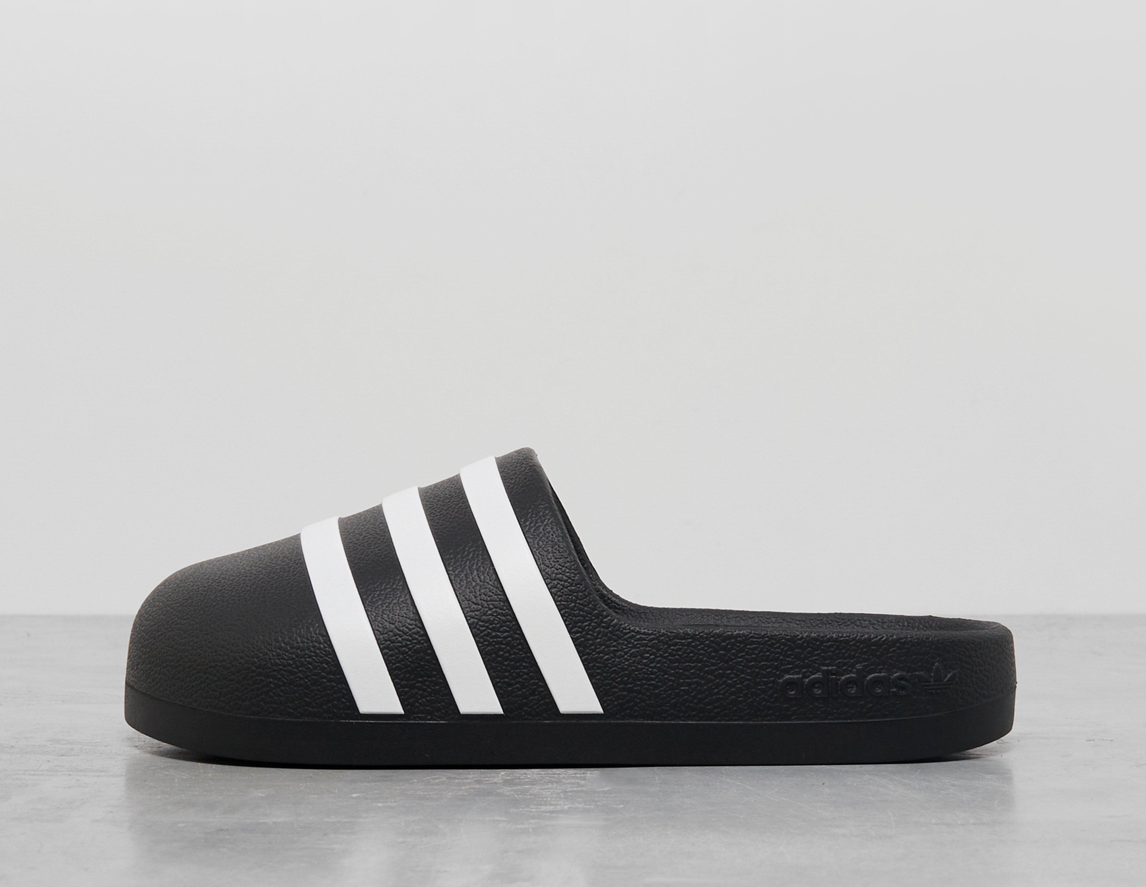 Adidas tuta lucida sale