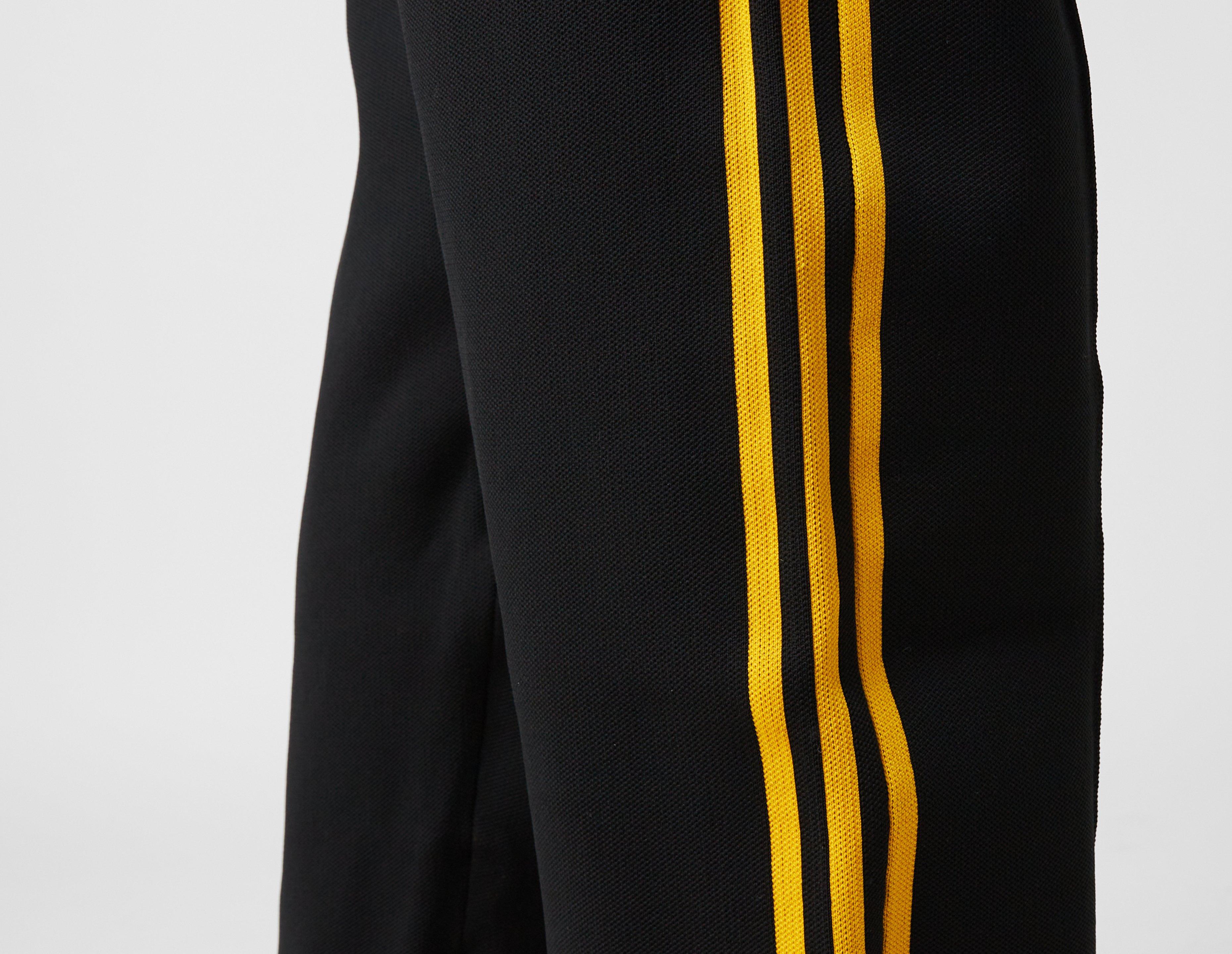 Adidas pants hot sale yellow stripes