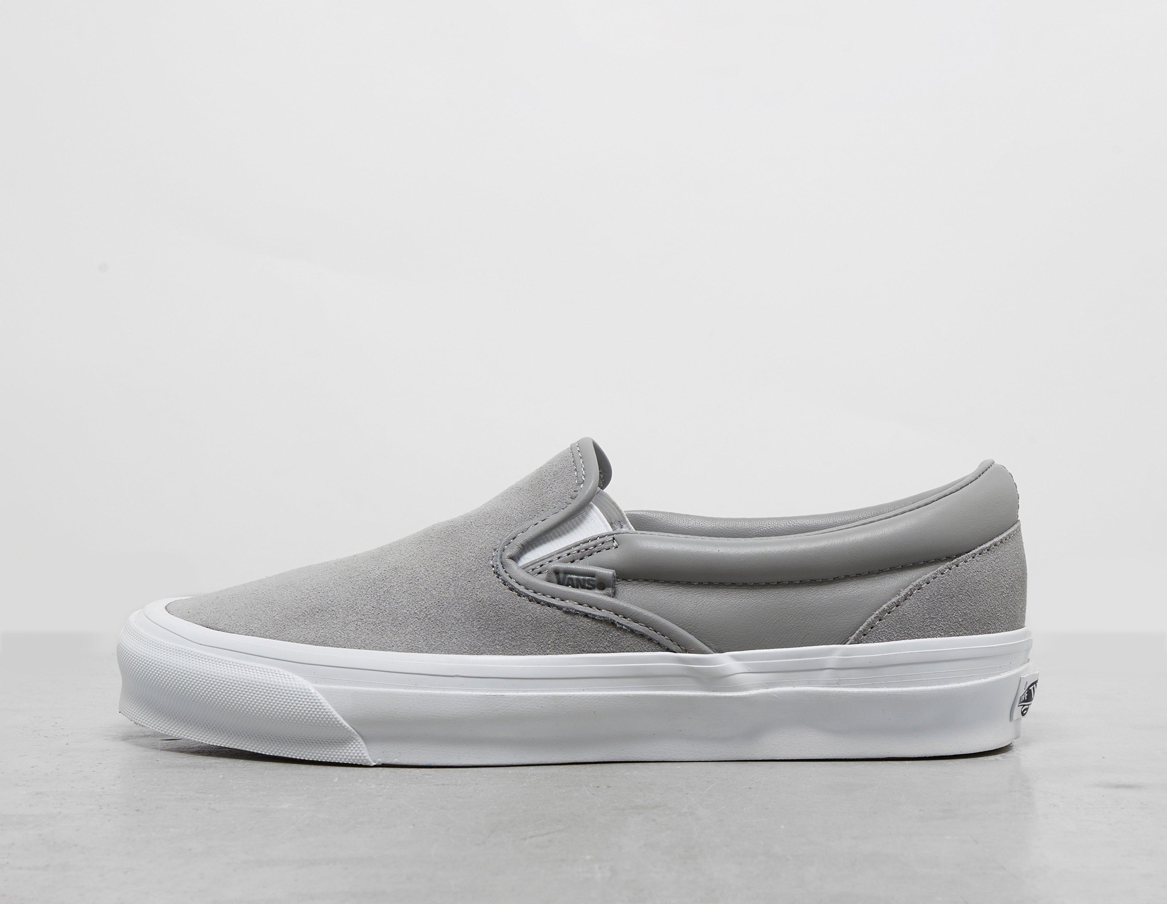 Light gray slip on hot sale vans