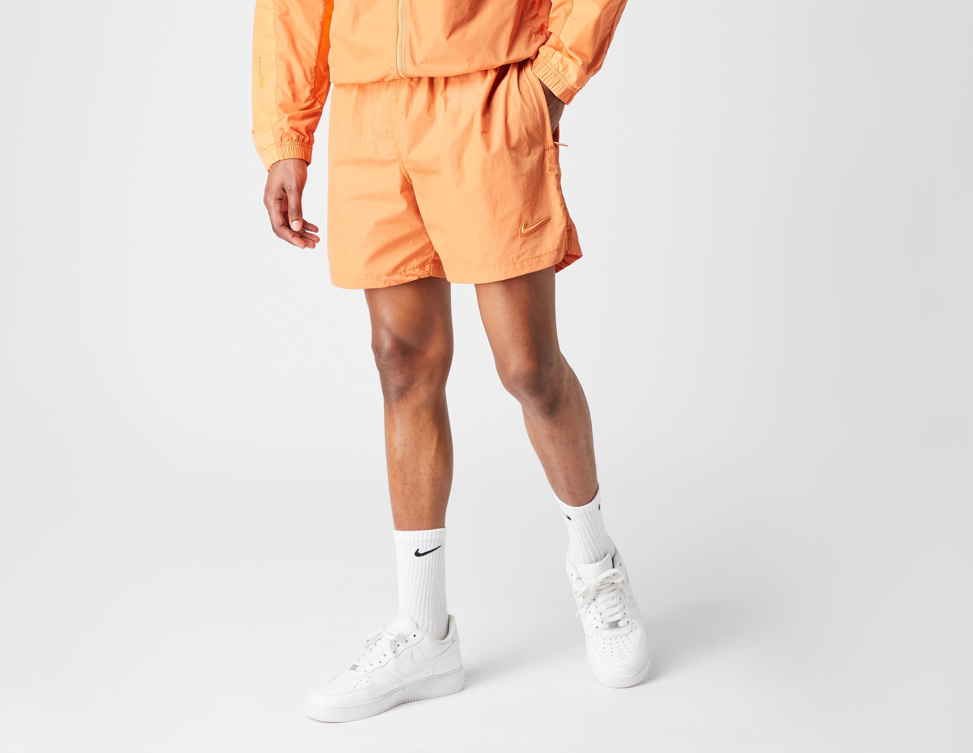 Nike woven logo shorts orange hotsell