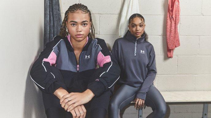 Modelos vistiendo las nuevas prendas de Under Armour