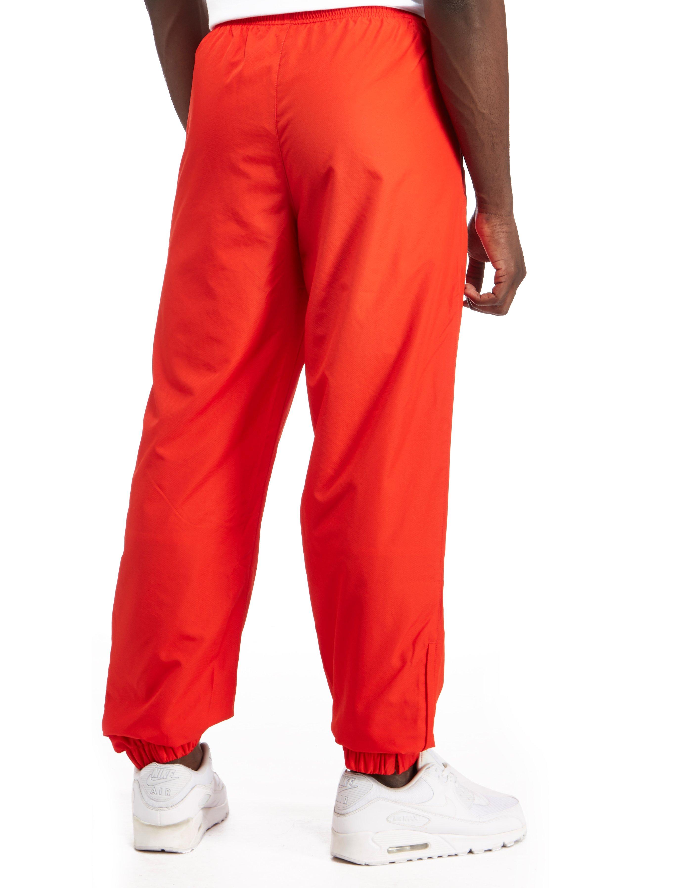 nike guppy track pants