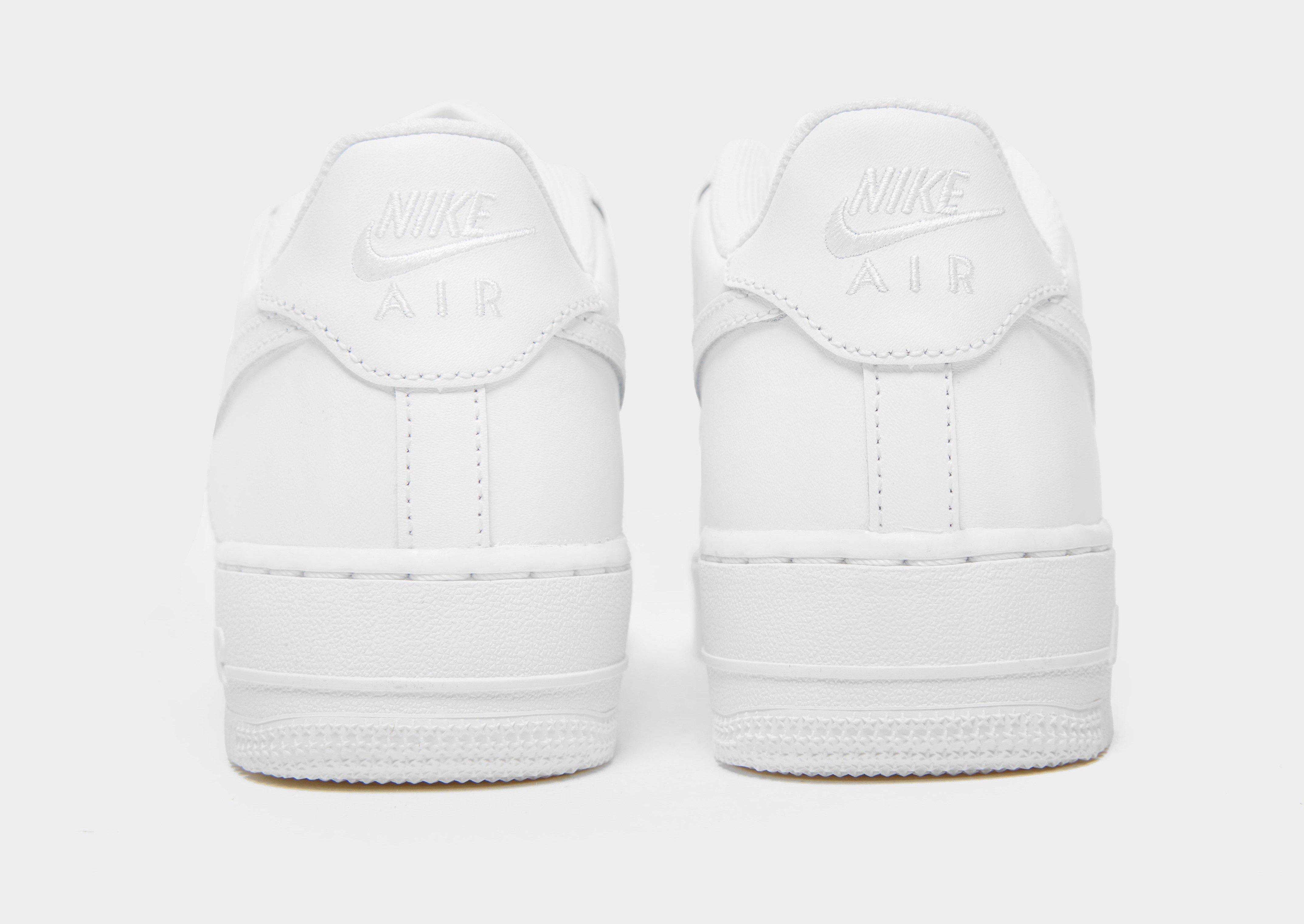 nike air force 1 black and white junior