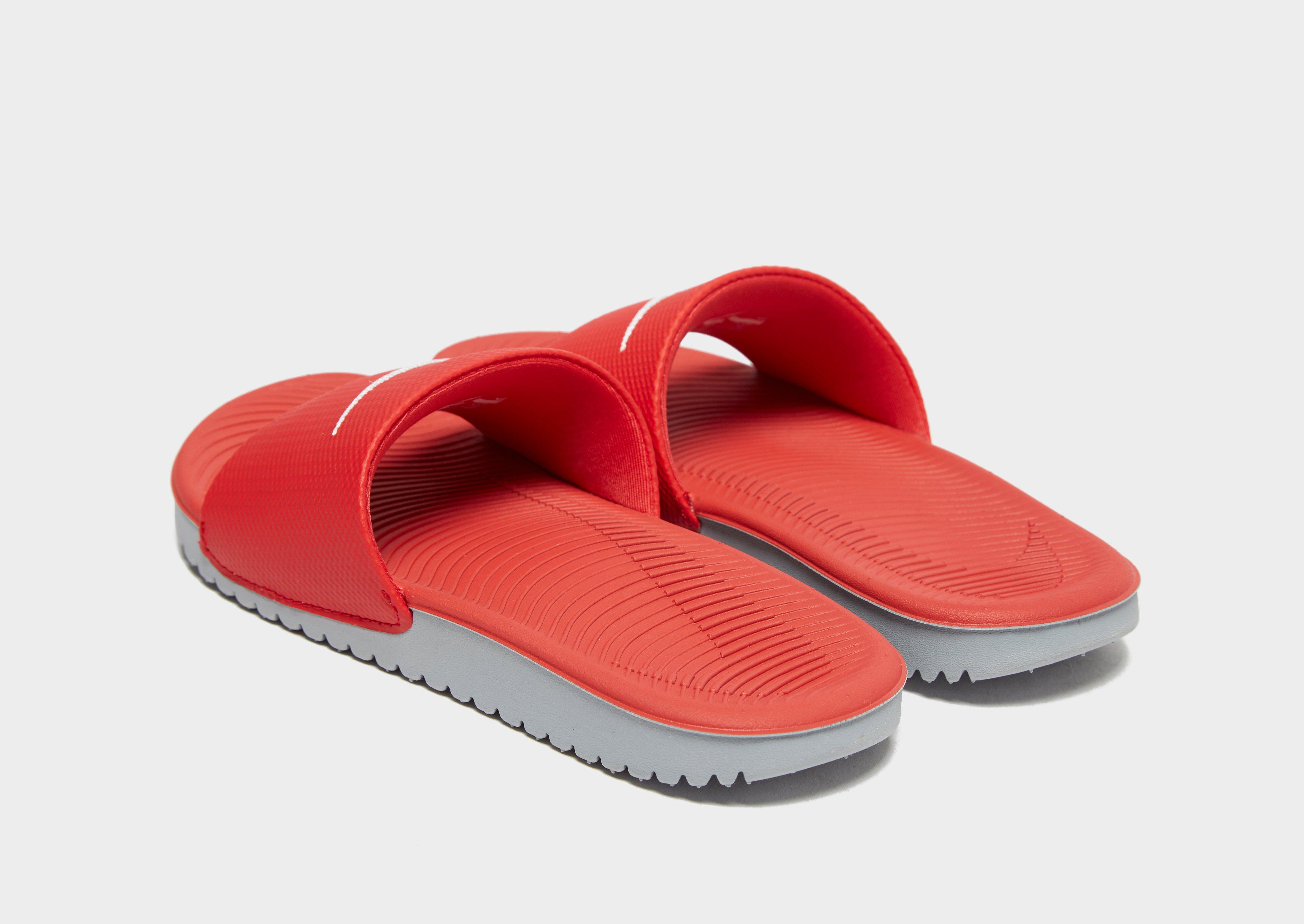 red nike slides youth