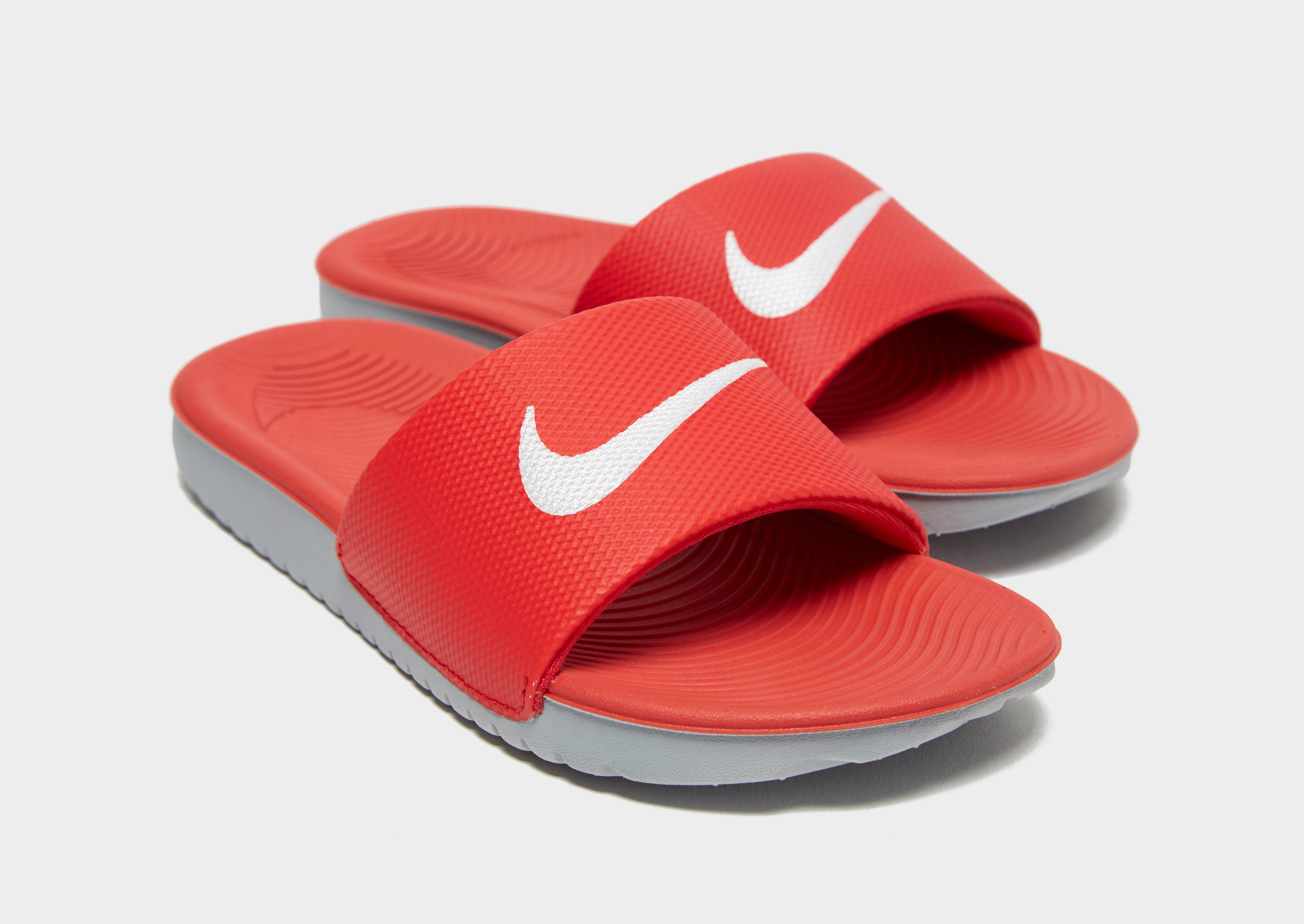 red nike slides kids