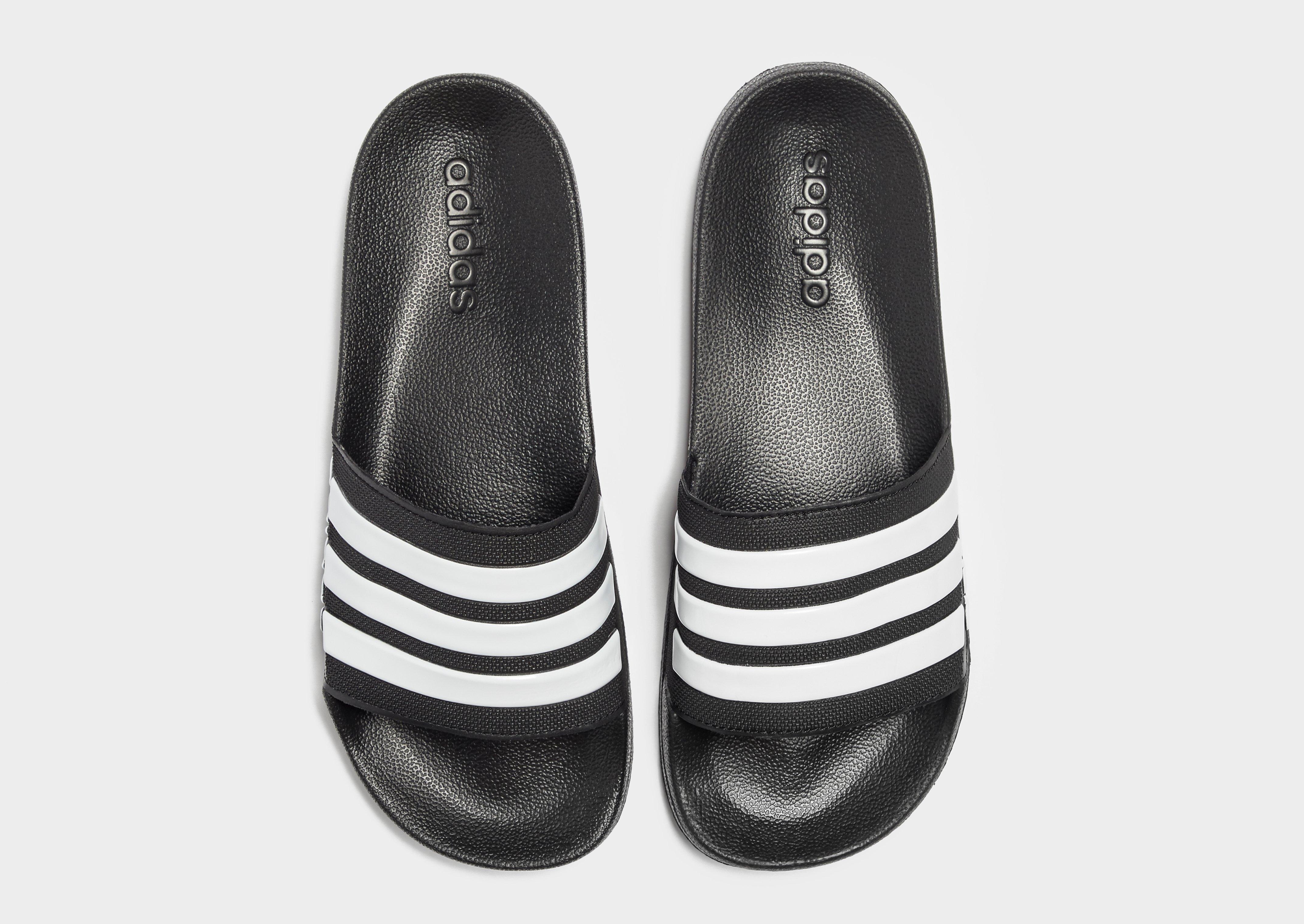 nike benassi vs adidas cloudfoam