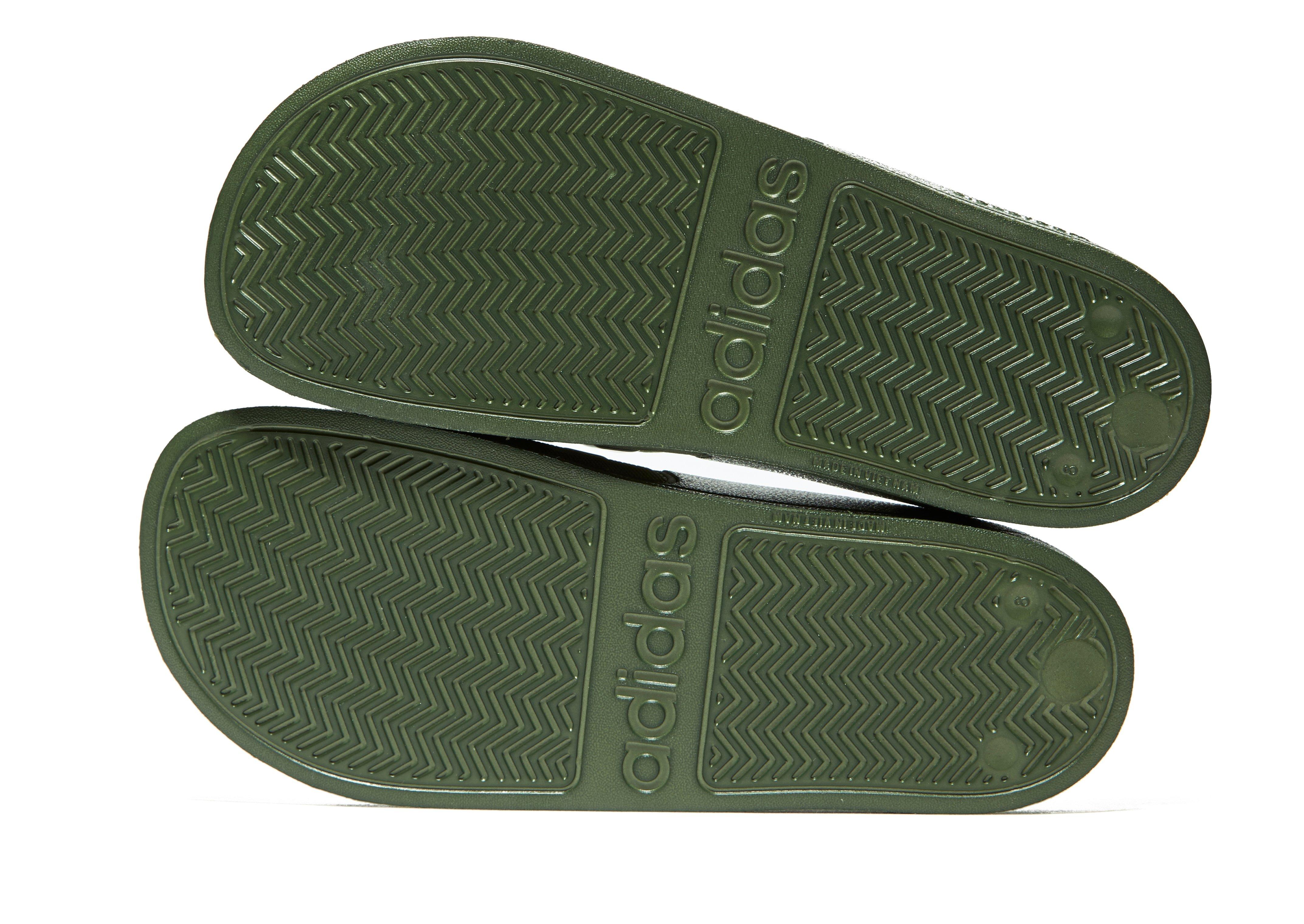 lime green adidas slides