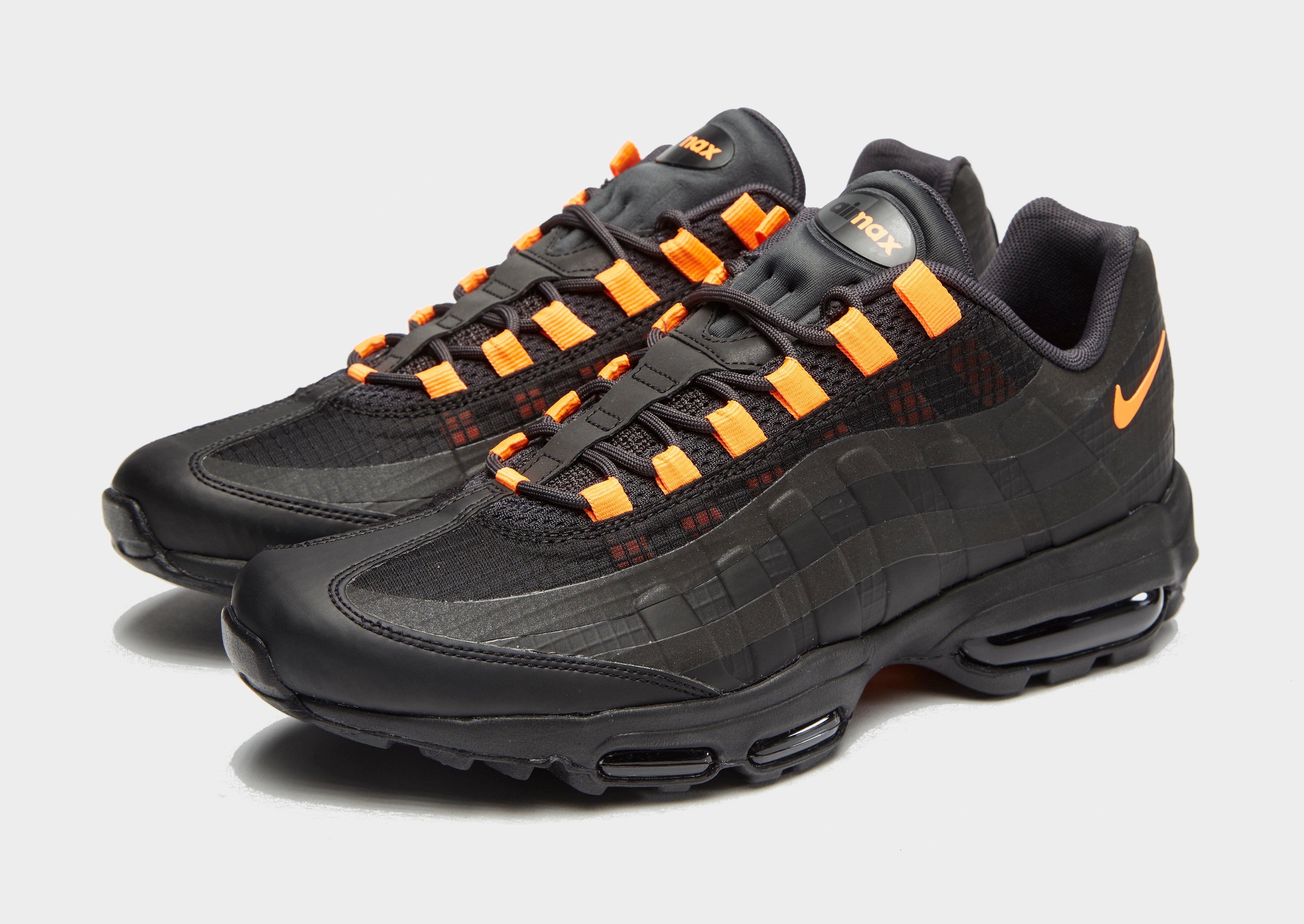 black and orange nike 95