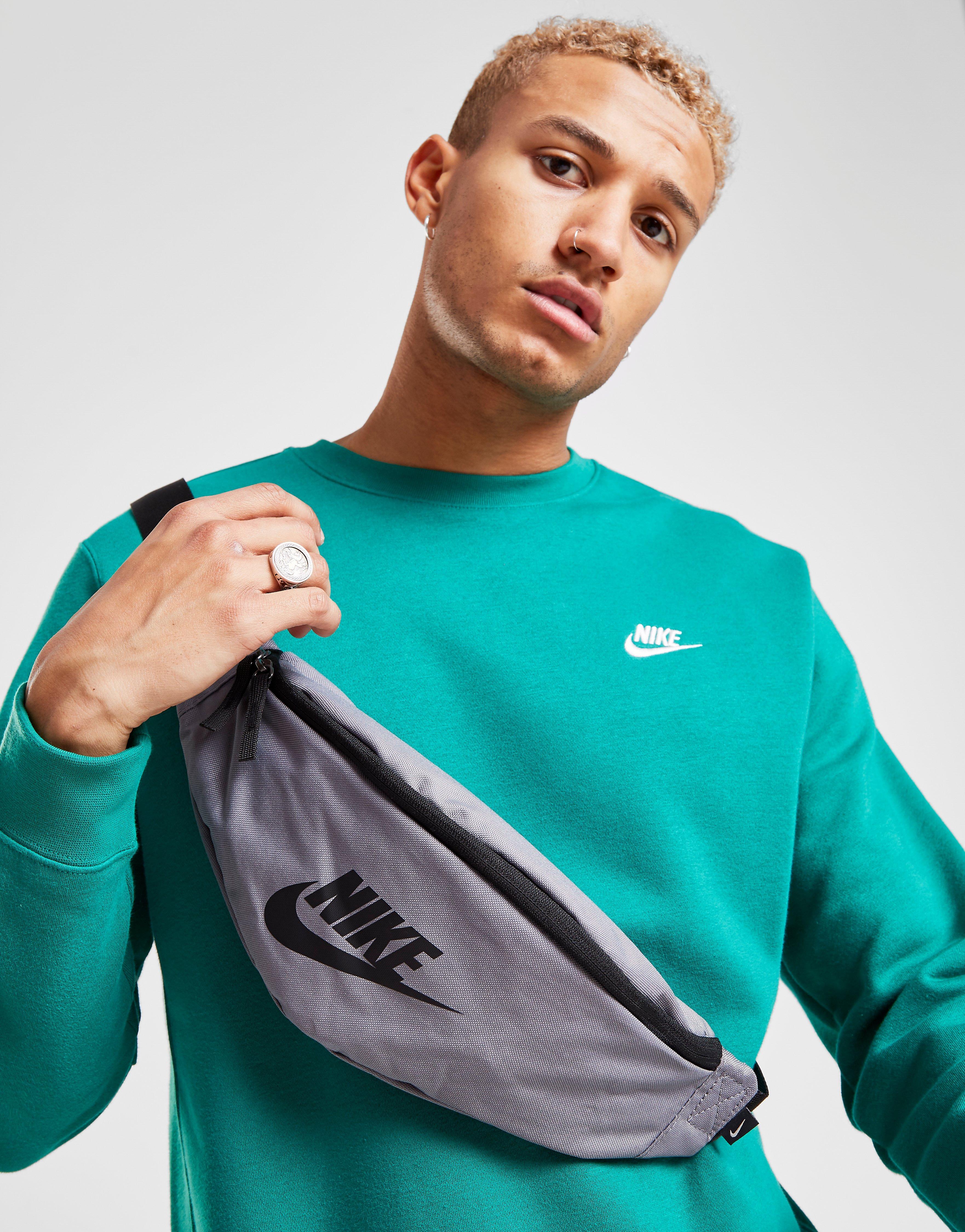 green nike man bag