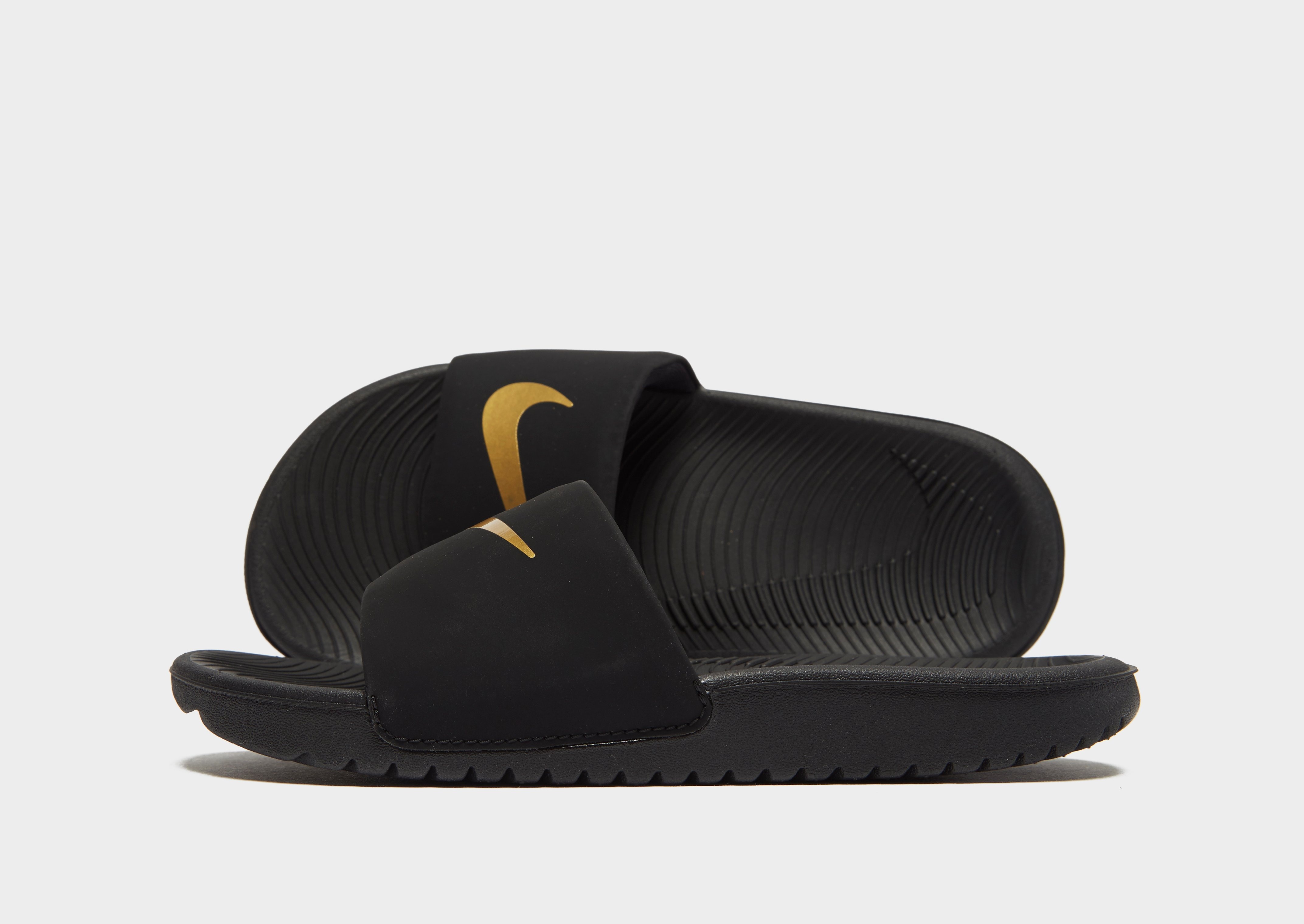 junior nike sliders