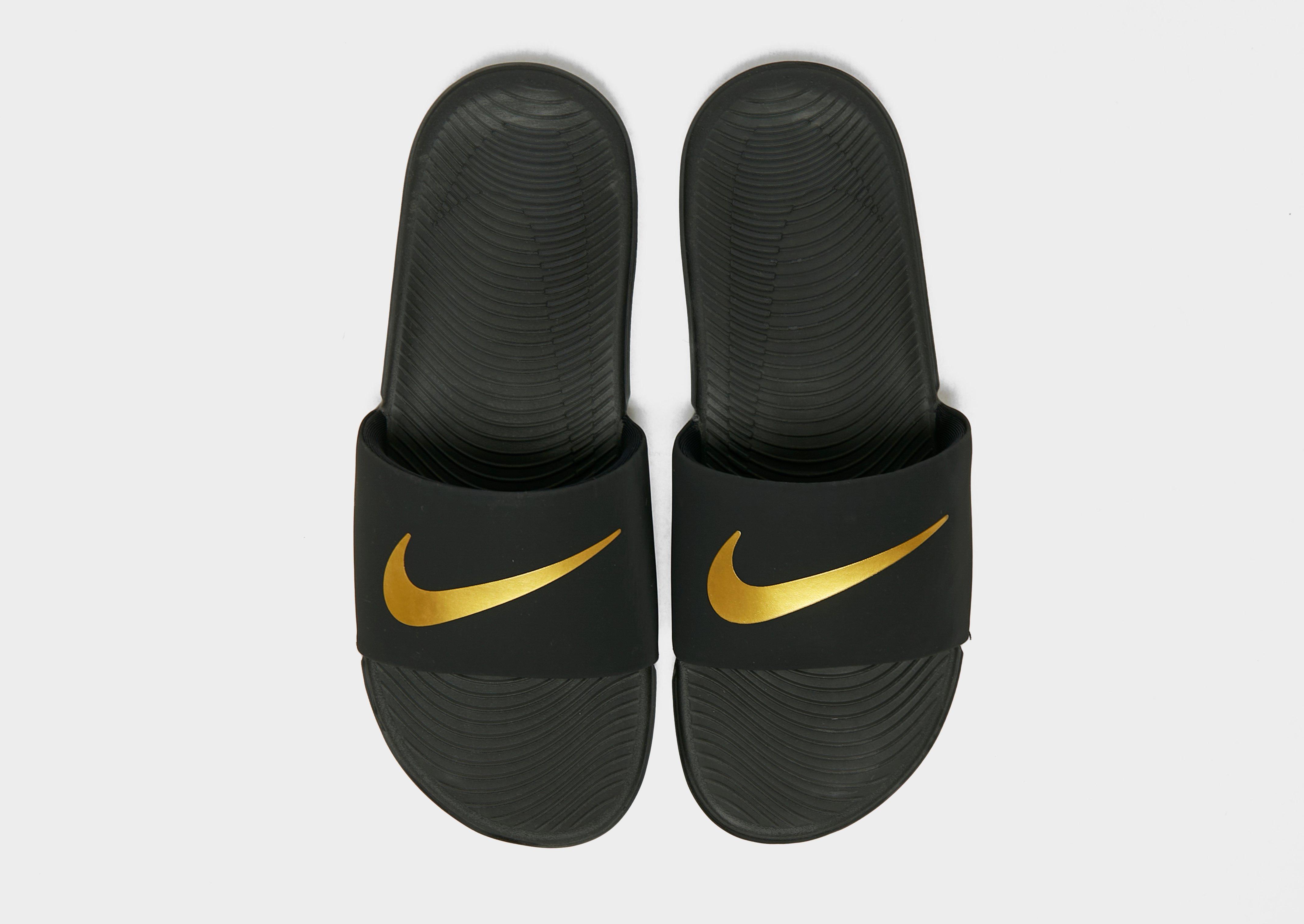 Compra Nike Kawa Slides Junior en Negro