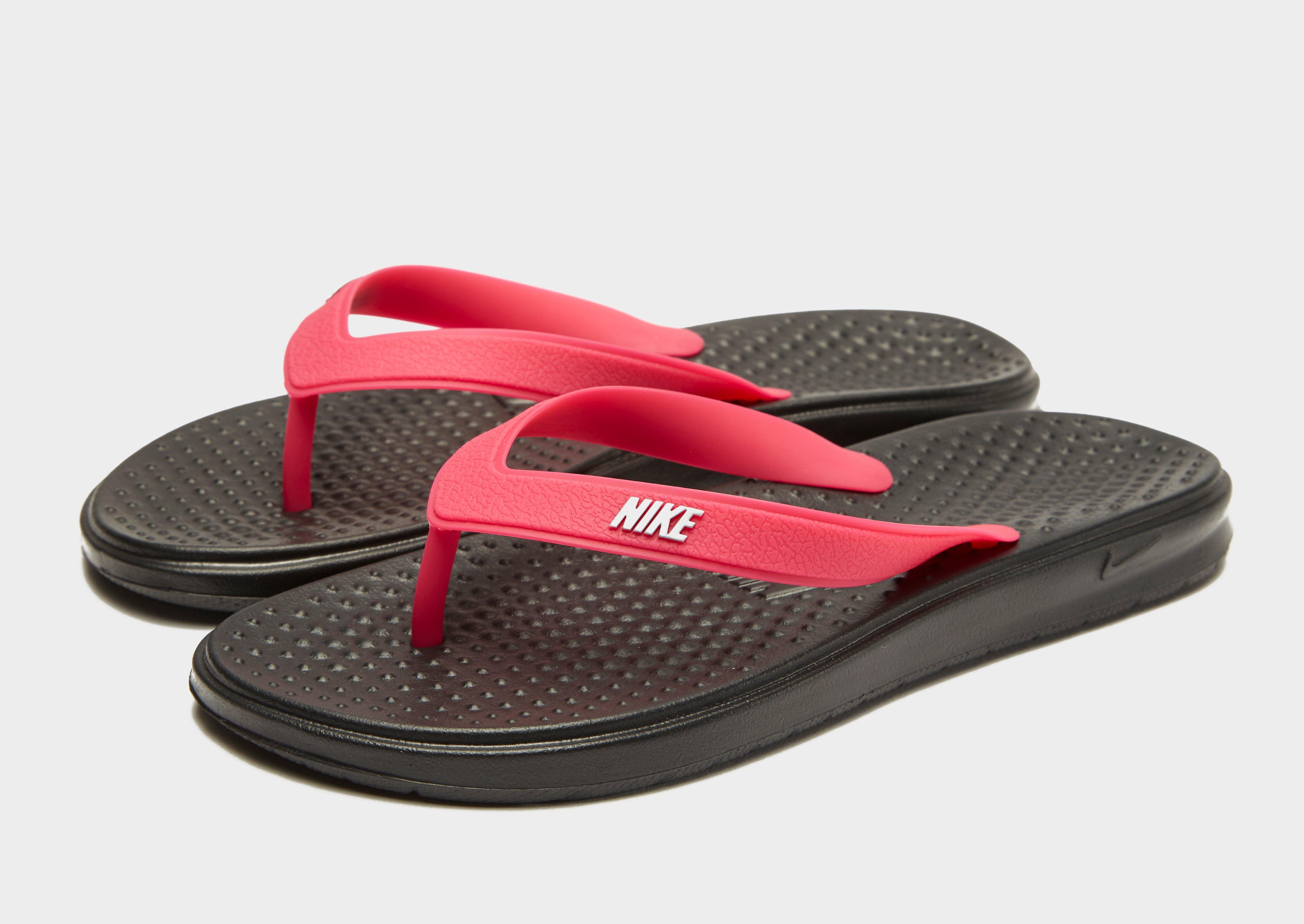 nike flip flops junior