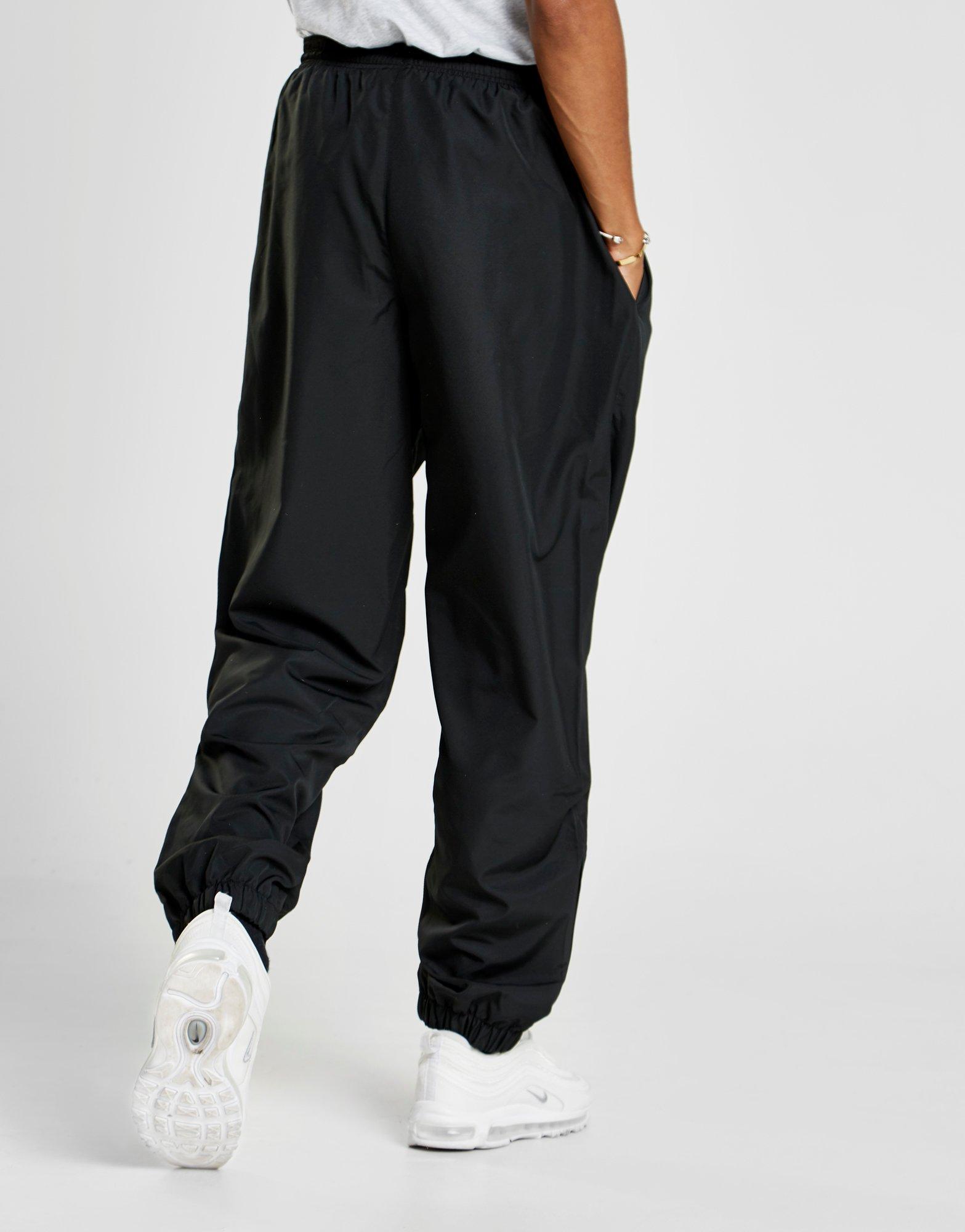 nike guppy track pants