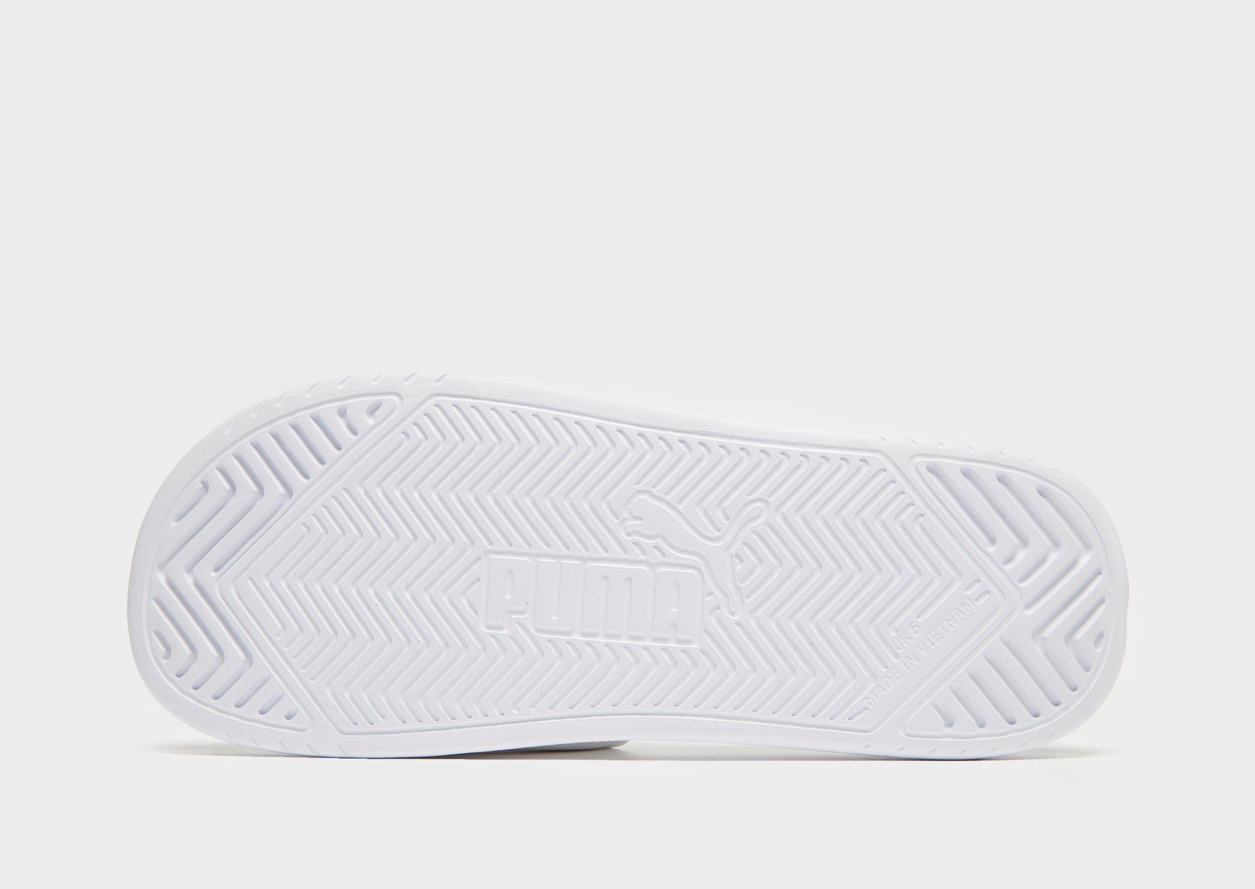 all white puma slides