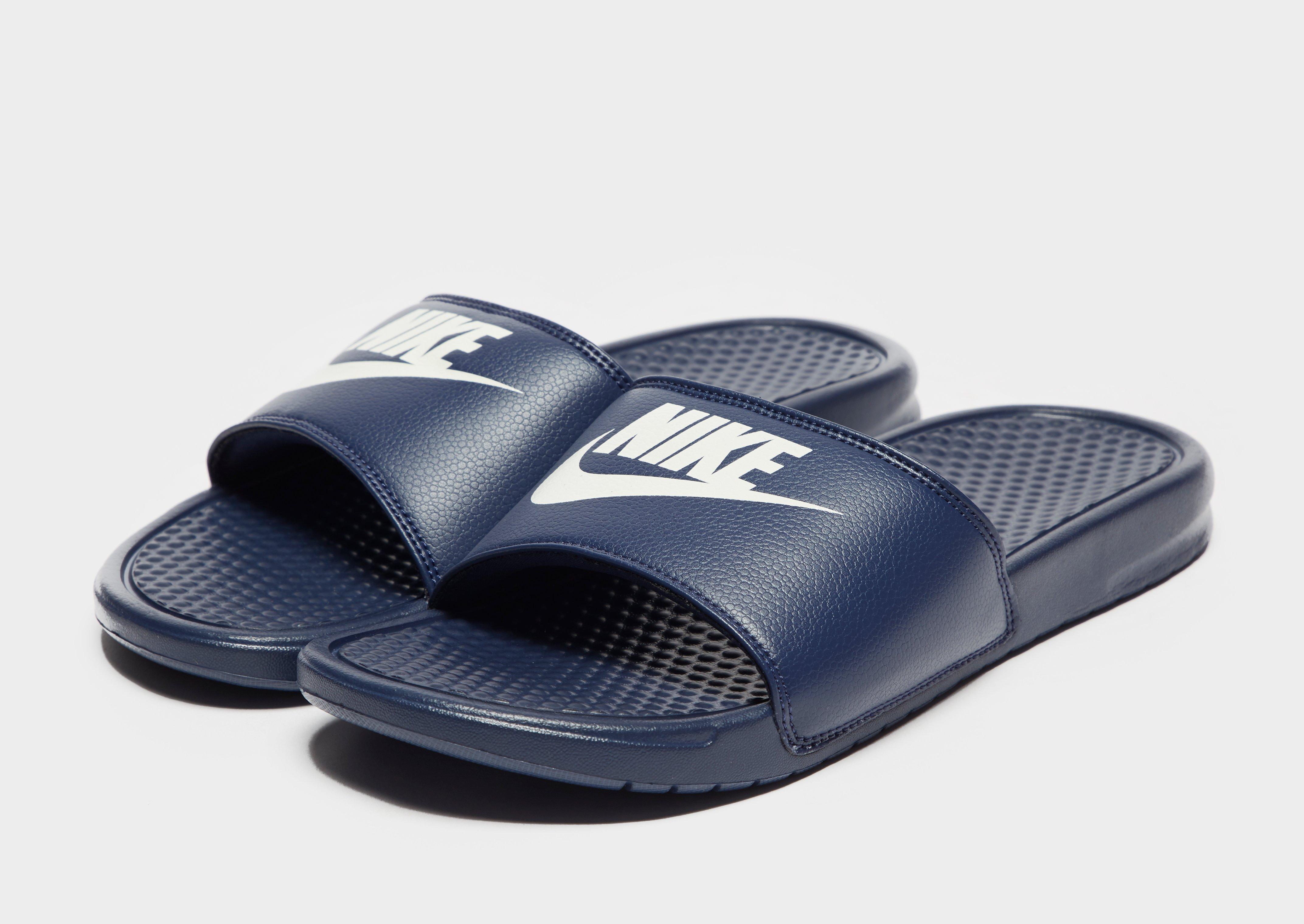 buy nike benassi slides