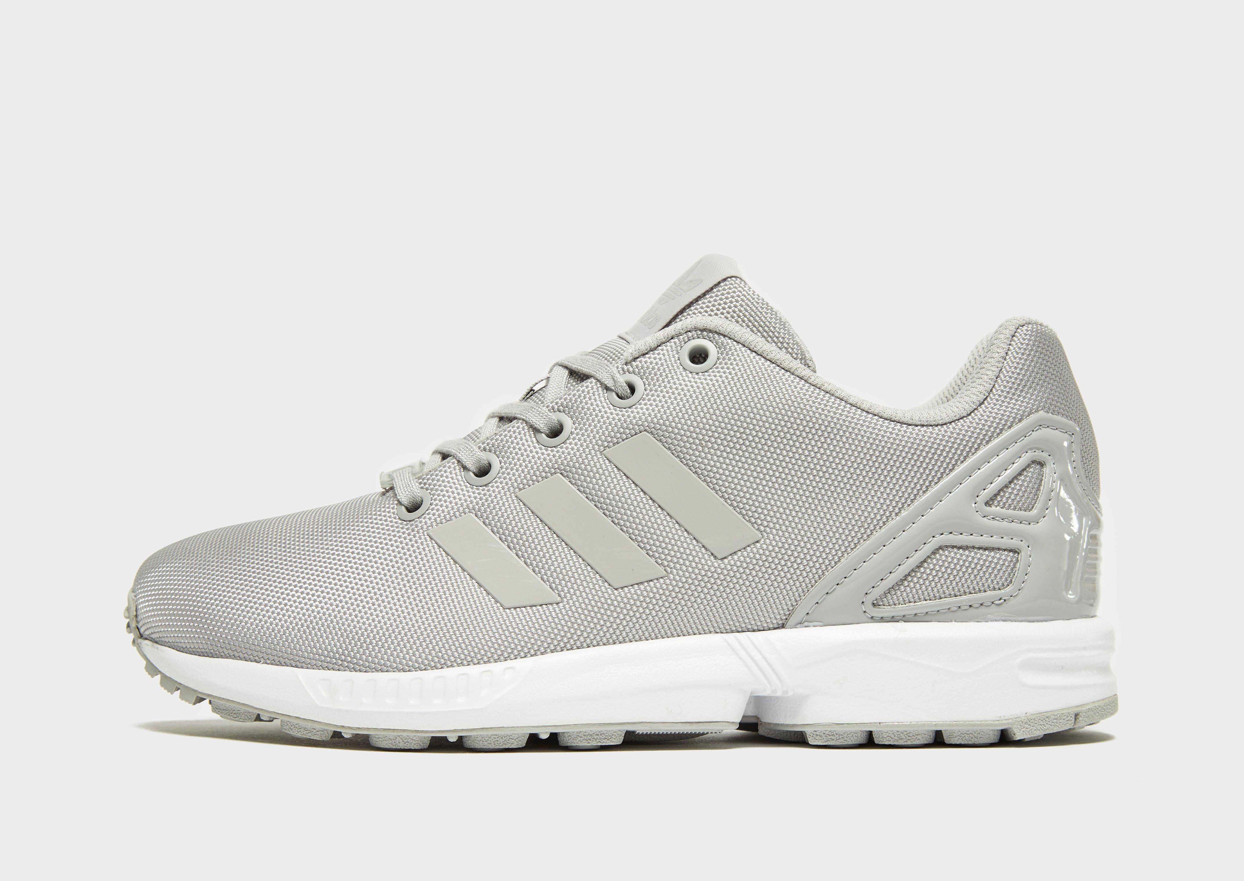 white adidas flux junior