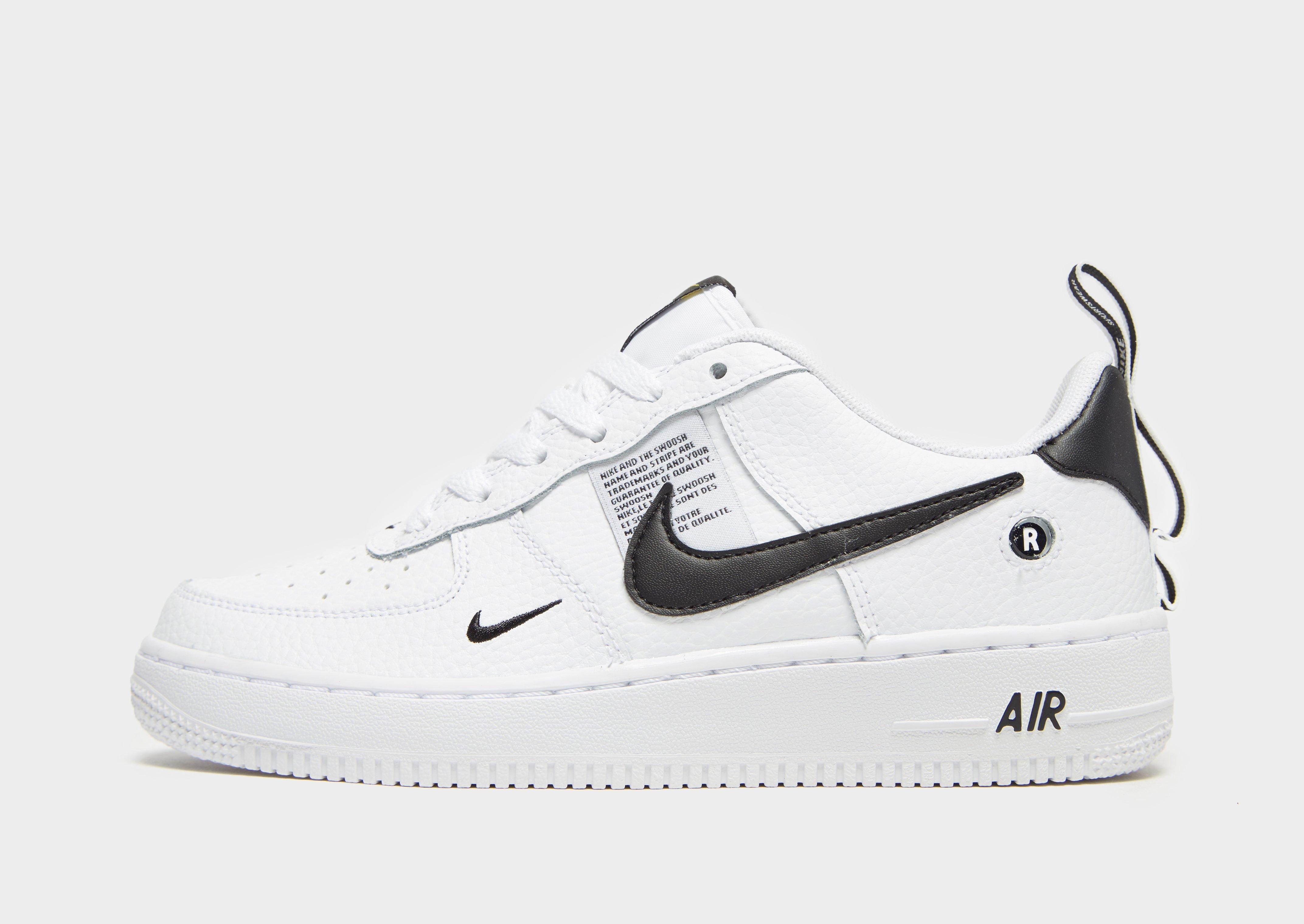 white and black nike air force 1 junior