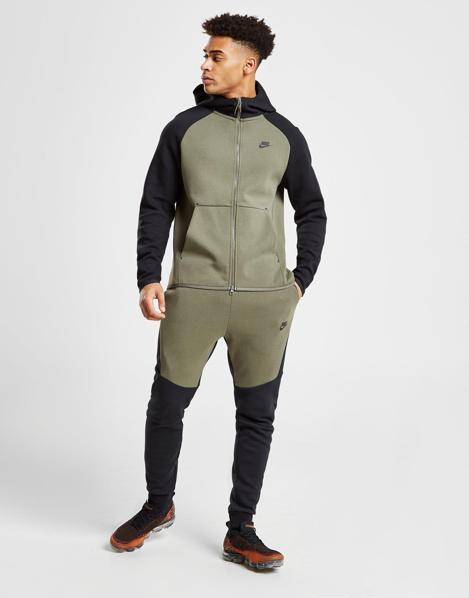 green nike tech tracksuit