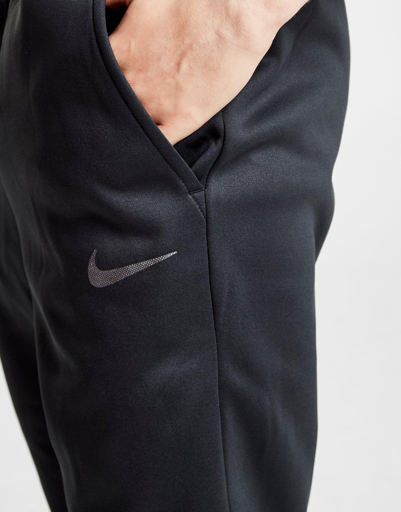 nike train poly track pants